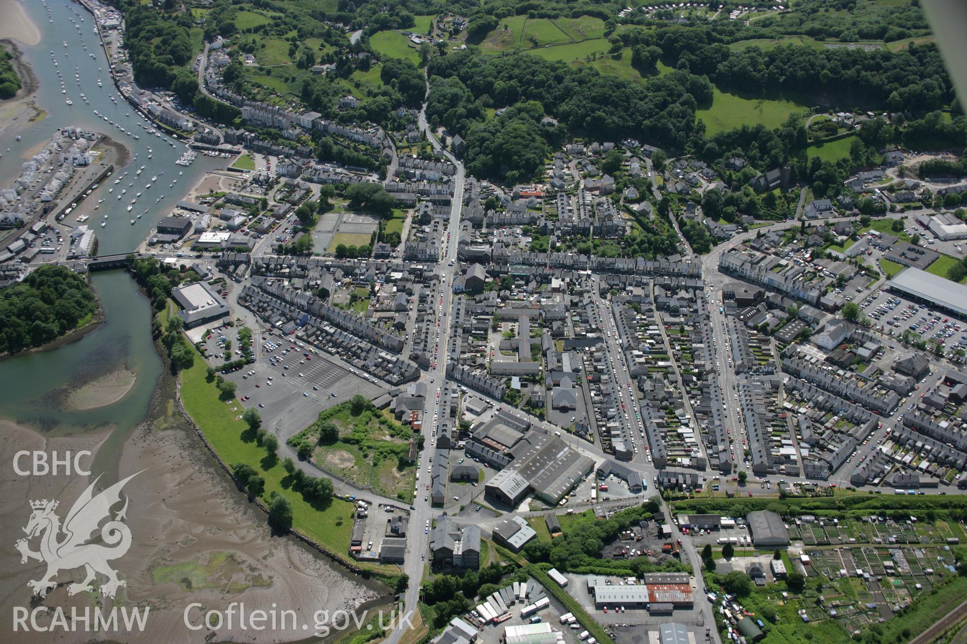 RCAHMW colour oblique aerial photograph of Porthmadog Town from the north-east. Taken on 14 June 2006 by Toby Driver.