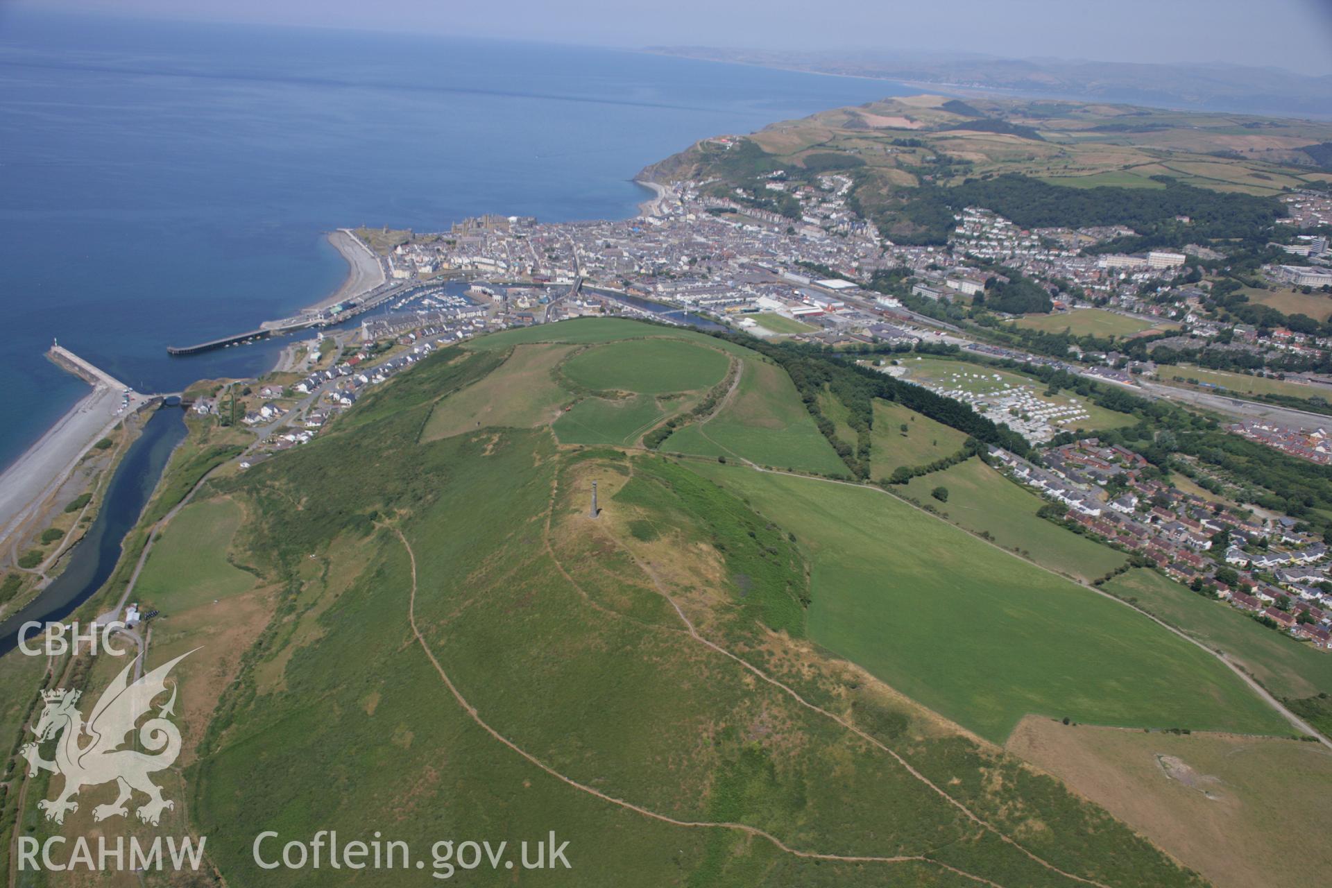 RCAHMW colour oblique aerial photograph of Pen Dinas Hillfort, Aberystwyth. Taken on 17 July 2006 by Toby Driver.