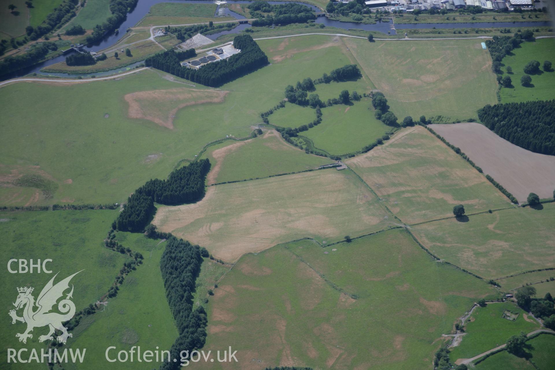 RCAHMW colour oblique aerial photograph of Llanfor Roman Fort. Taken on 25 July 2006 by Toby Driver.