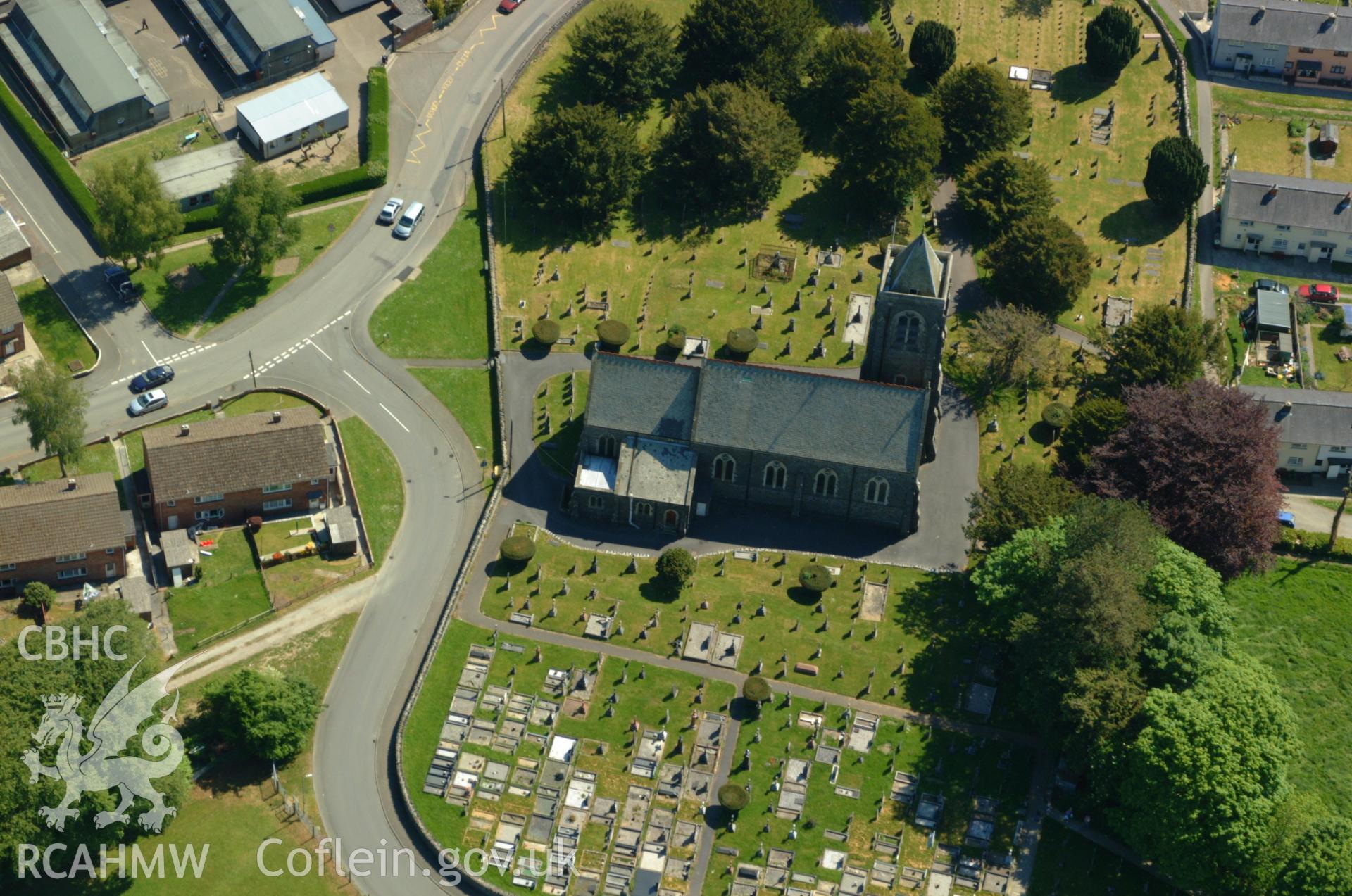 RCAHMW colour oblique aerial photograph of St Peter's Church, Lampeter taken on 24/05/2004 by Toby Driver