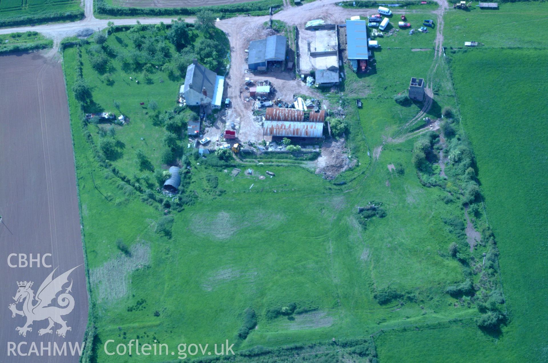 RCAHMW colour oblique aerial photograph of Perth-hir ruins taken on 02/06/2004 by Toby Driver