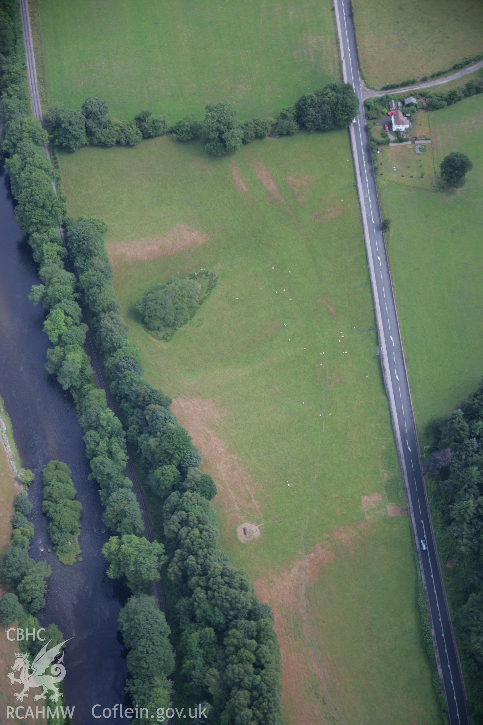 RCAHMW colour oblique aerial photograph of Owen Glyndwr's House Moat. Taken on 31 July 2006 by Toby Driver.