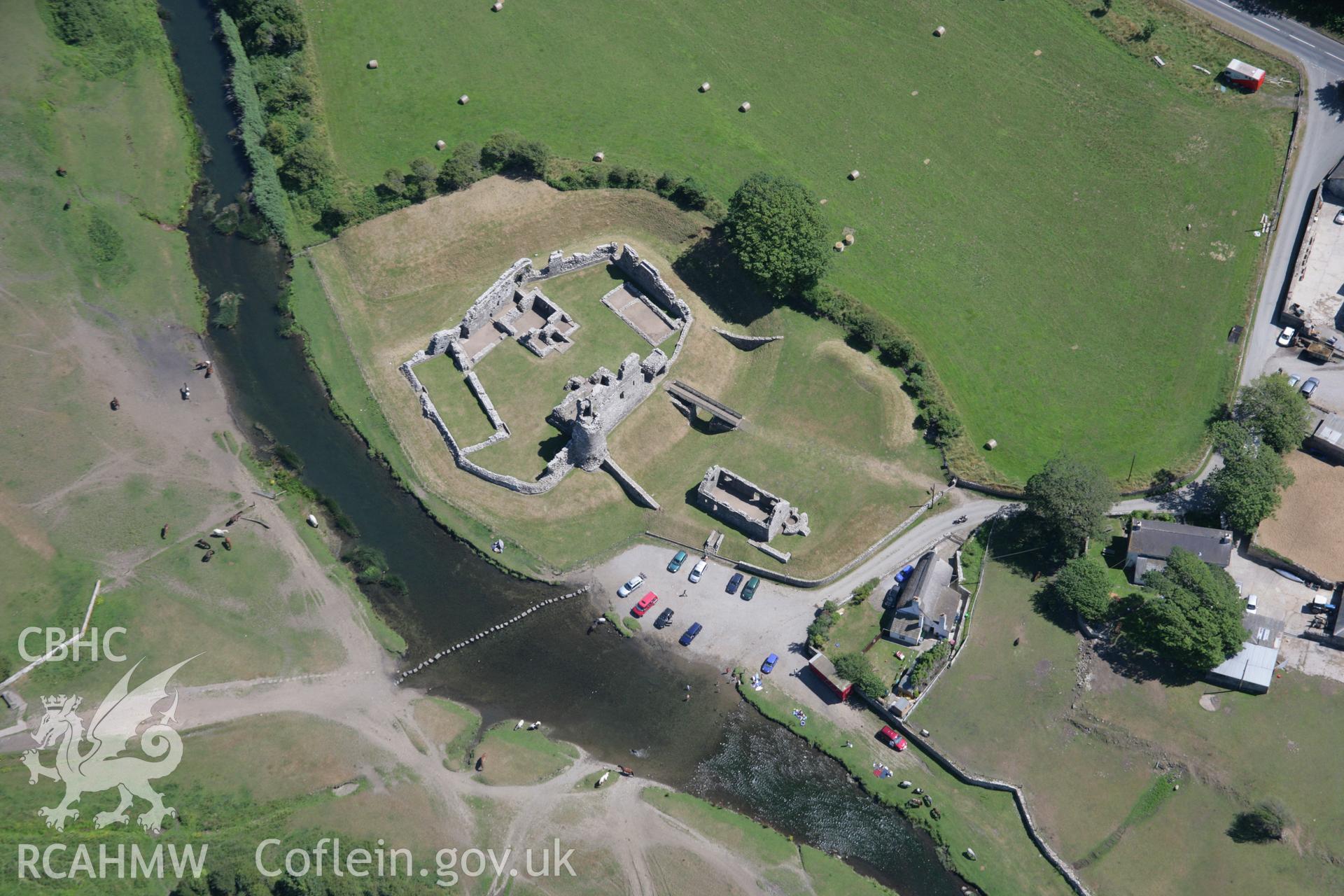 RCAHMW colour oblique aerial photograph of Ogmore Castle. Taken on 24 July 2006 by Toby Driver.