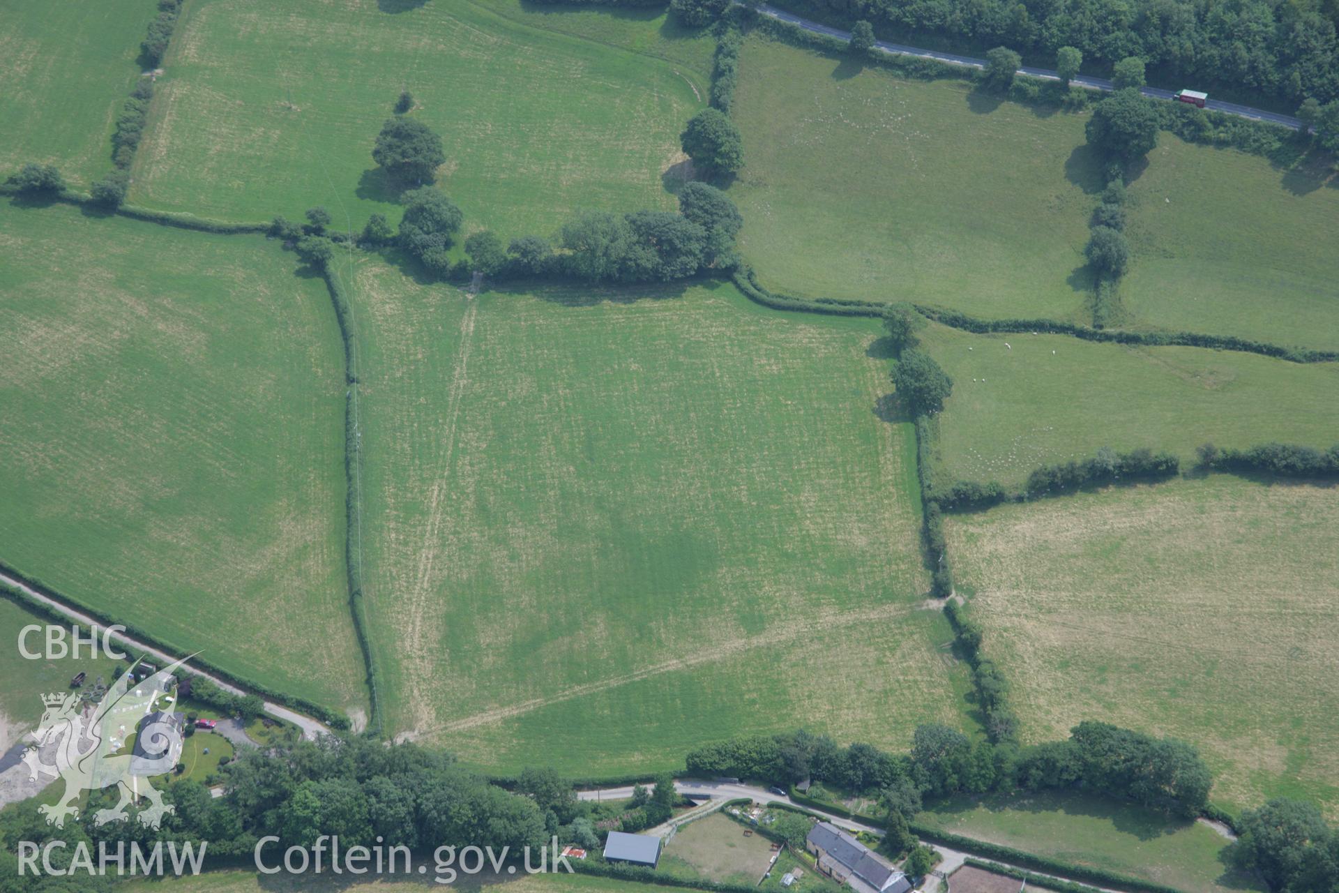 RCAHMW colour oblique aerial photograph of the cropmarks at Cyncoed that possibly represent an enclosure.. Taken on 04 July 2006 by Toby Driver.