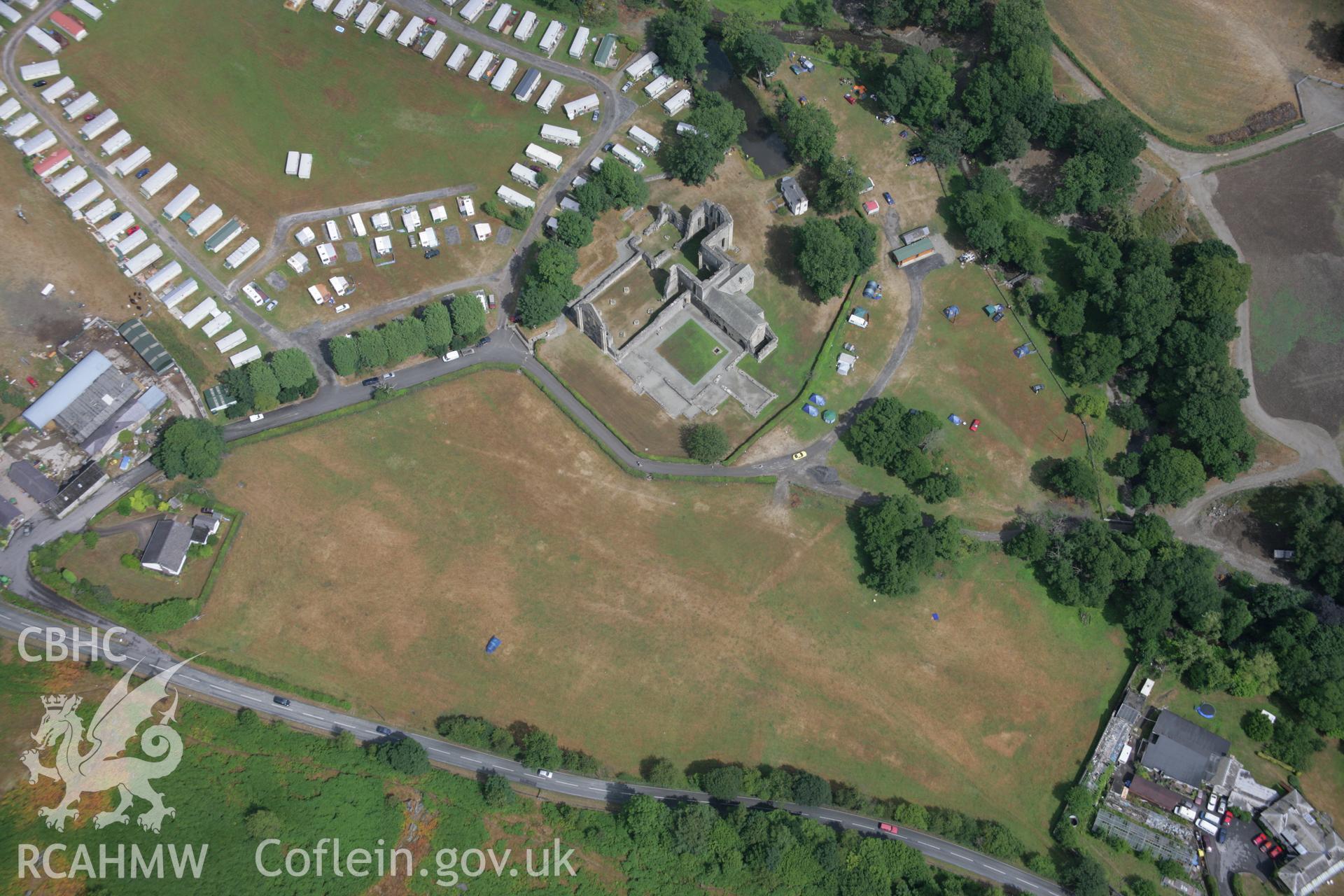 RCAHMW colour oblique aerial photograph of Valle Crucis Abbey showing parchmarks. Taken on 31 July 2006 by Toby Driver.
