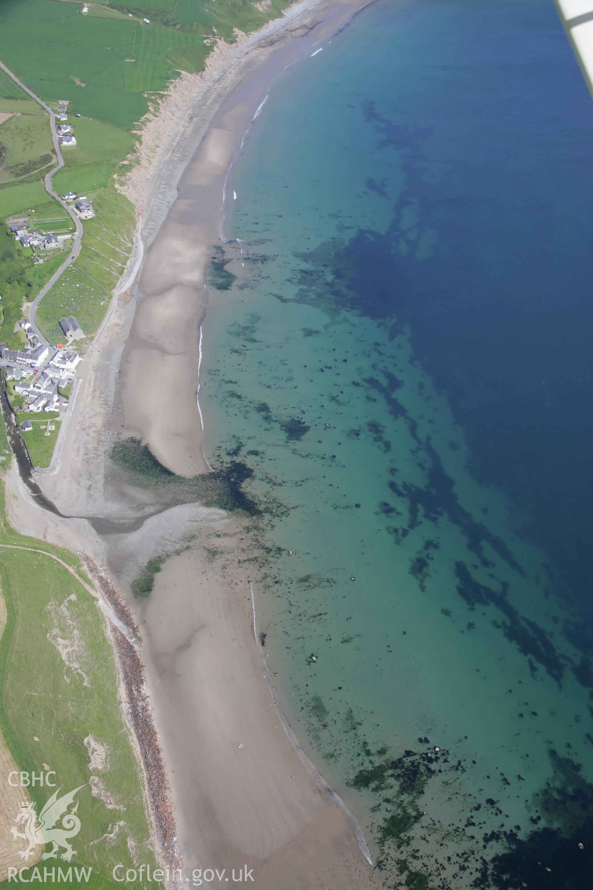 RCAHMW colour oblique aerial photograph of Aberdaron with the seafront from the west. Taken on 14 June 2006 by Toby Driver.