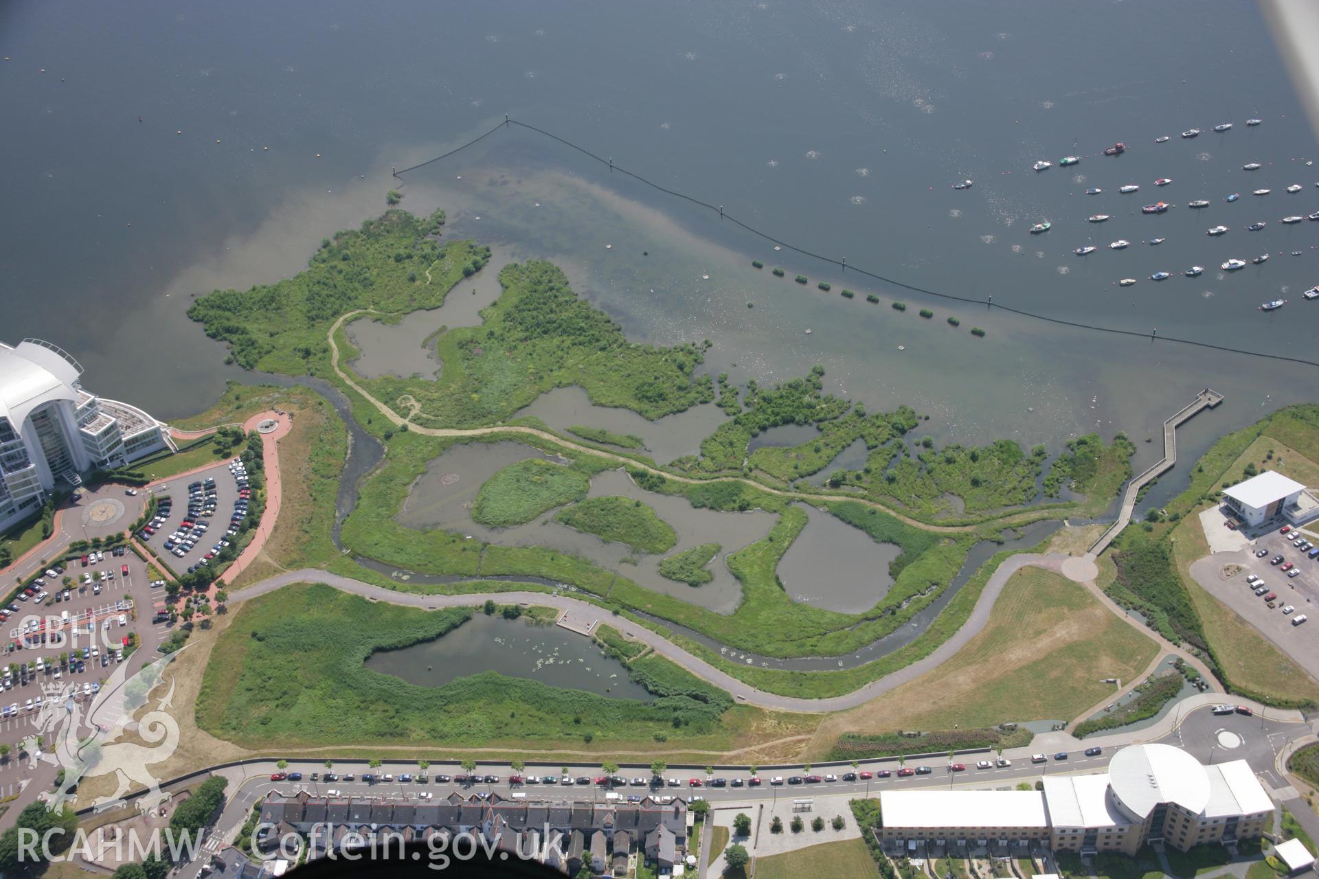 RCAHMW colour oblique photograph of Cardiff Bay, salt marshes and nature reserve. Taken by Toby Driver on 29/06/2006.