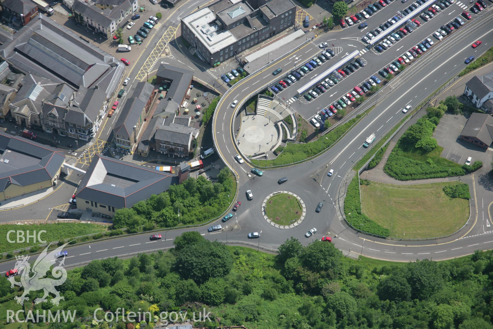RCAHMW colour oblique aerial photograph of Pontypool from the west showing the town centre and roundabout. Taken on 09 June 2006 by Toby Driver.