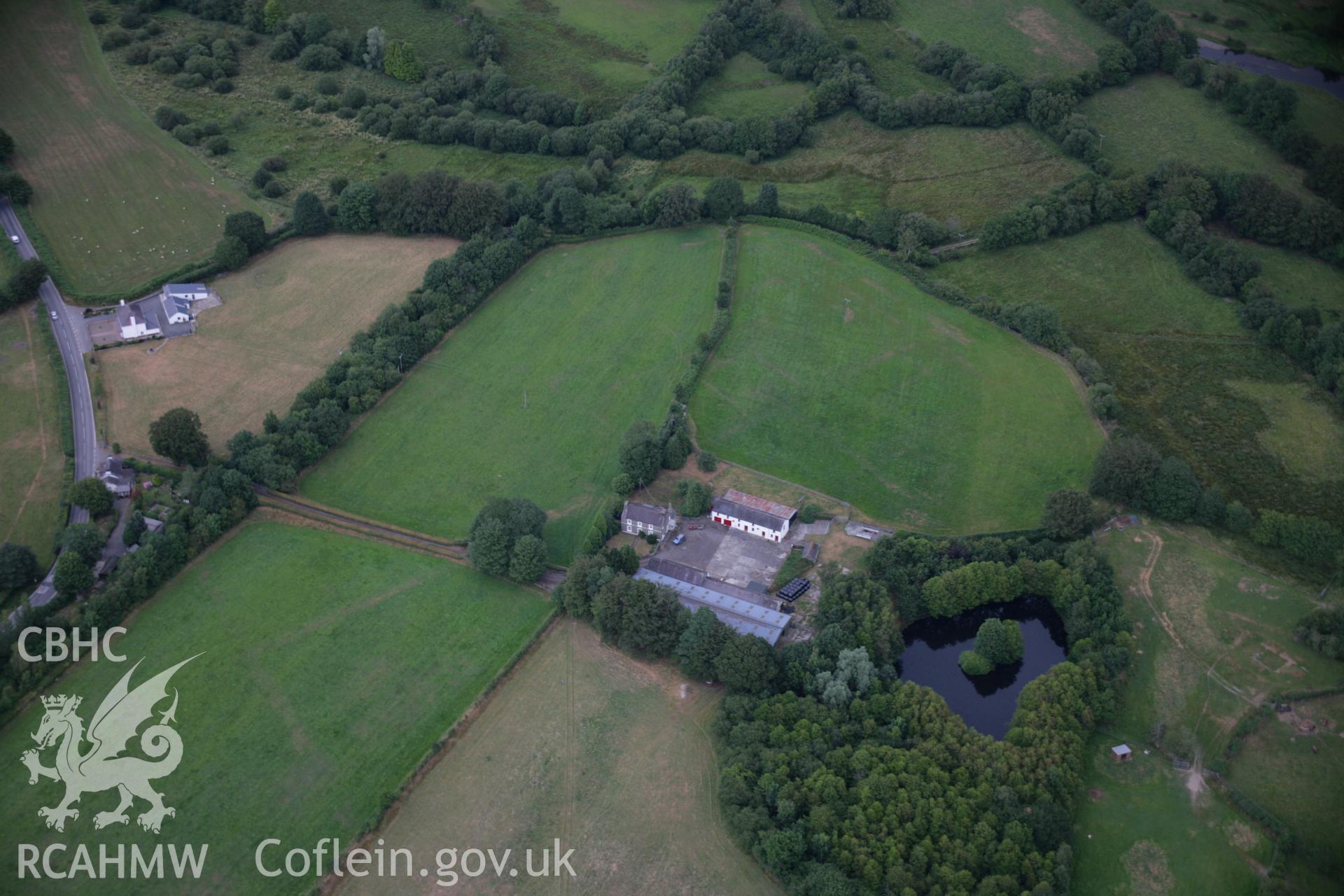 RCAHMW colour oblique aerial photograph of Llanio Roman Fort. Taken on 27 July 2006 by Toby Driver.