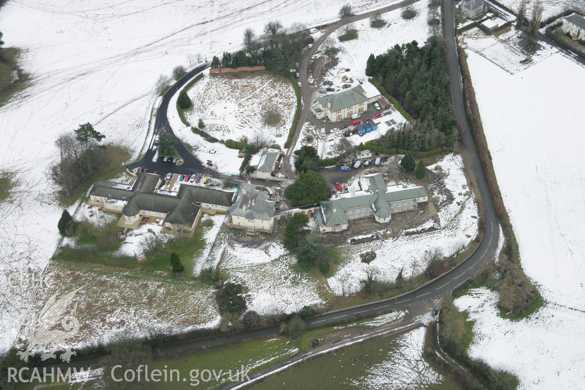 RCAHMW colour oblique aerial photograph of Gwynfryn (North Wales Counties Mental Hospital), from the south-west. Taken on 06 March 2006 by Toby Driver.