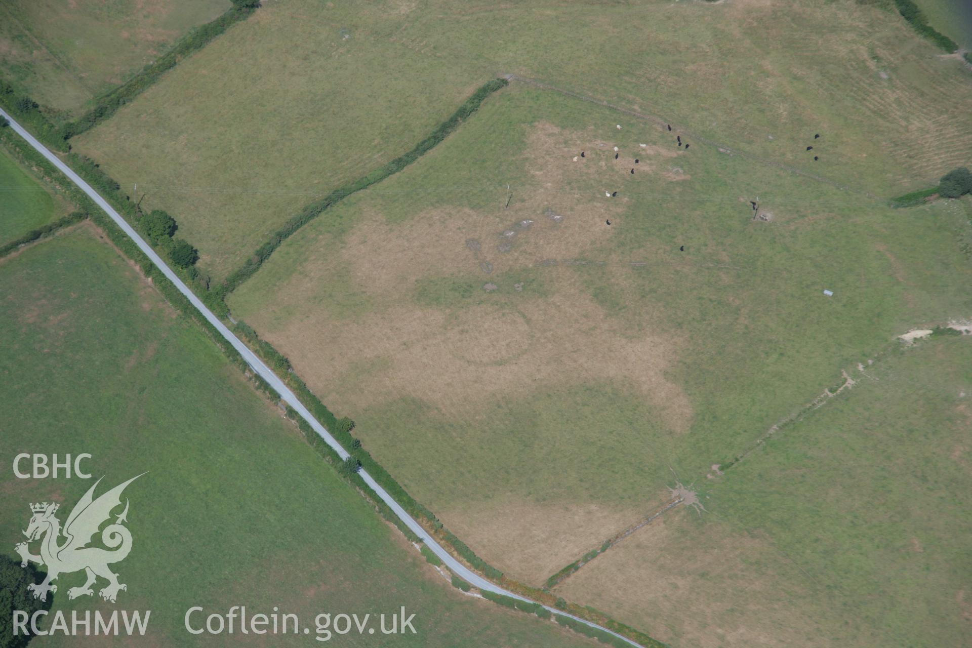 RCAHMW colour oblique aerial photograph of Penarth Fawr ring ditch.. Taken on 25 July 2006 by Toby Driver.