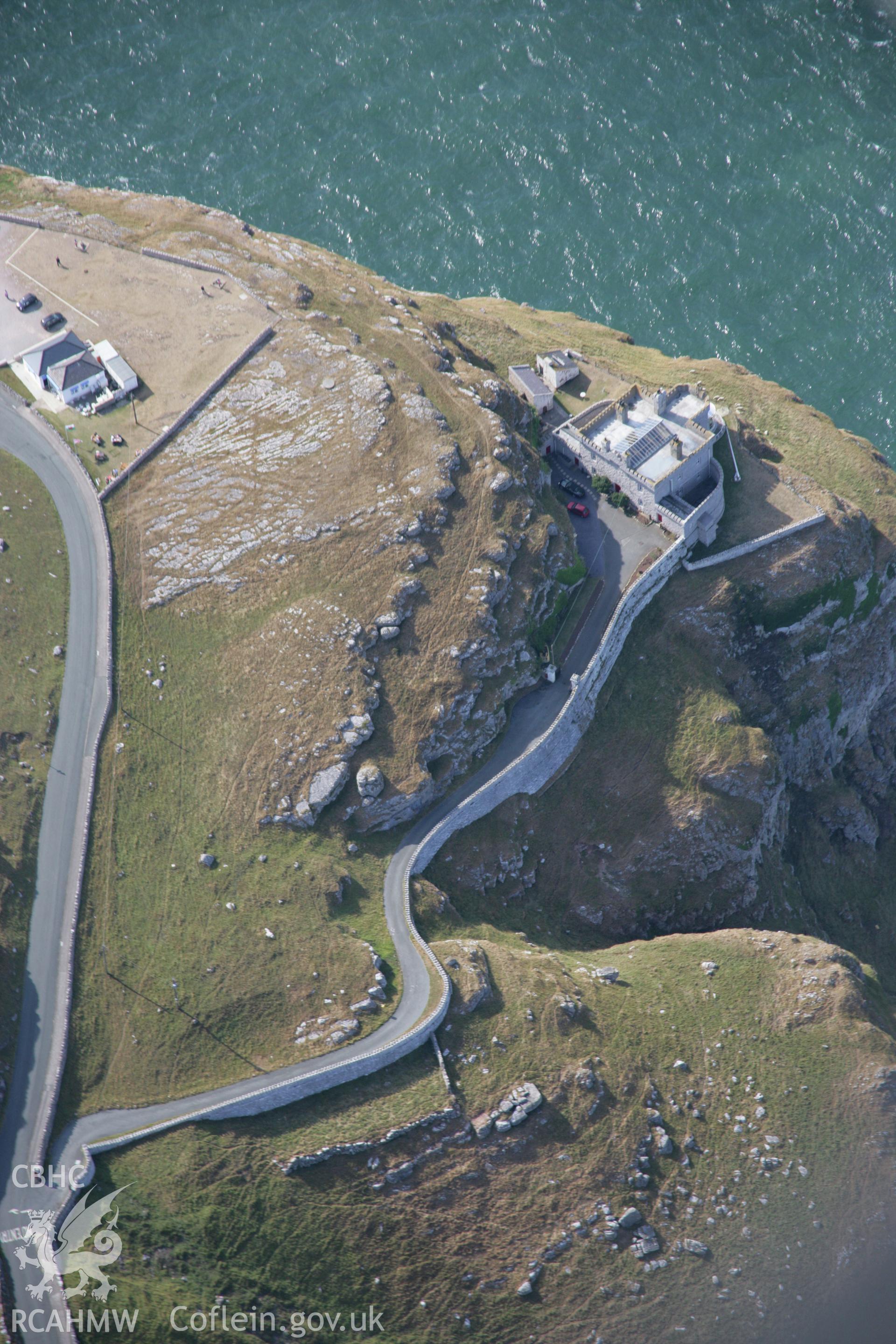 RCAHMW colour oblique aerial photograph of Great Ormes Head Light House. Taken on 14 August 2006 by Toby Driver.