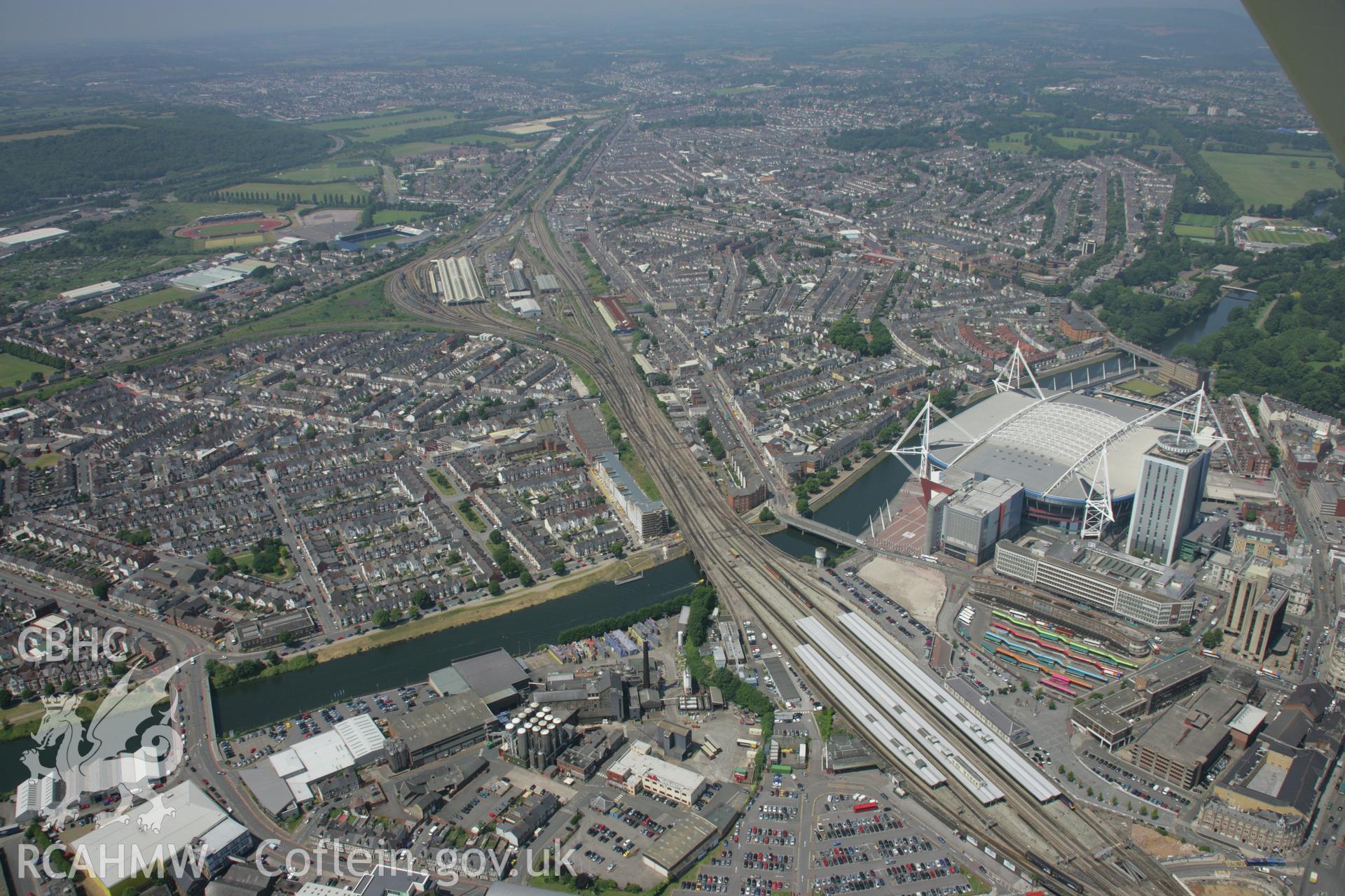 RCAHMW colour oblique photograph of Cardiff city centre and Millennium Stadium. Taken by Toby Driver on 29/06/2006.