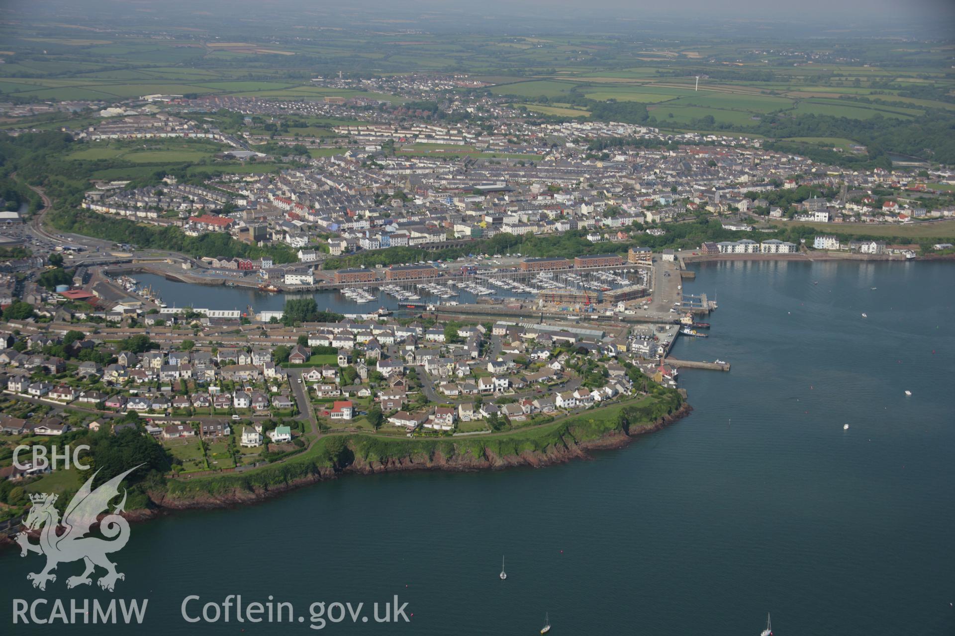 RCAHMW colour oblique aerial photograph of Milford Haven, viewed from the south-west. Taken on 08 June 2006 by Toby Driver.
