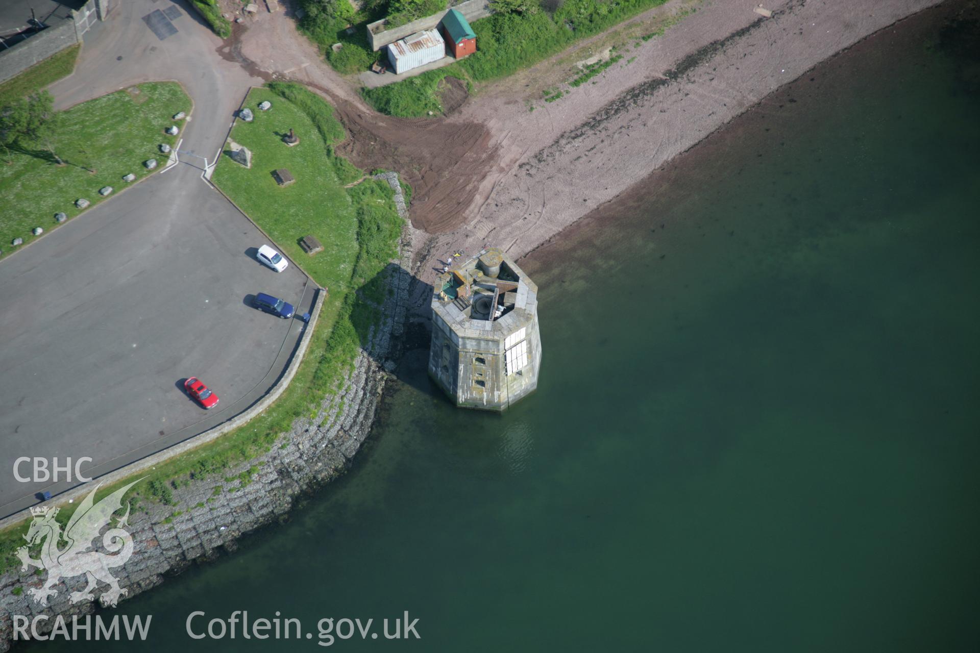 RCAHMW colour oblique aerial photograph of West Martello Tower at Pembroke Dockyard from the north-west. Taken on 08 June 2006 by Toby Driver.