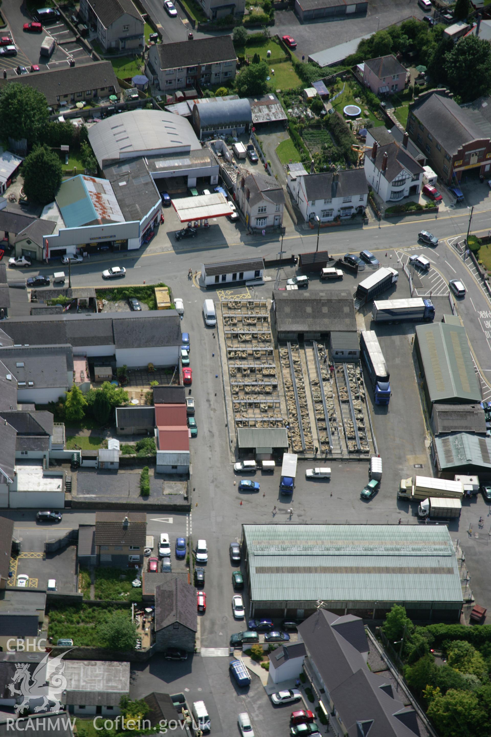 RCAHMW colour oblique aerial photograph of Newcastle Emlyn, showing view of livestock market from the north-east. Taken on 08 June 2006 by Toby Driver.