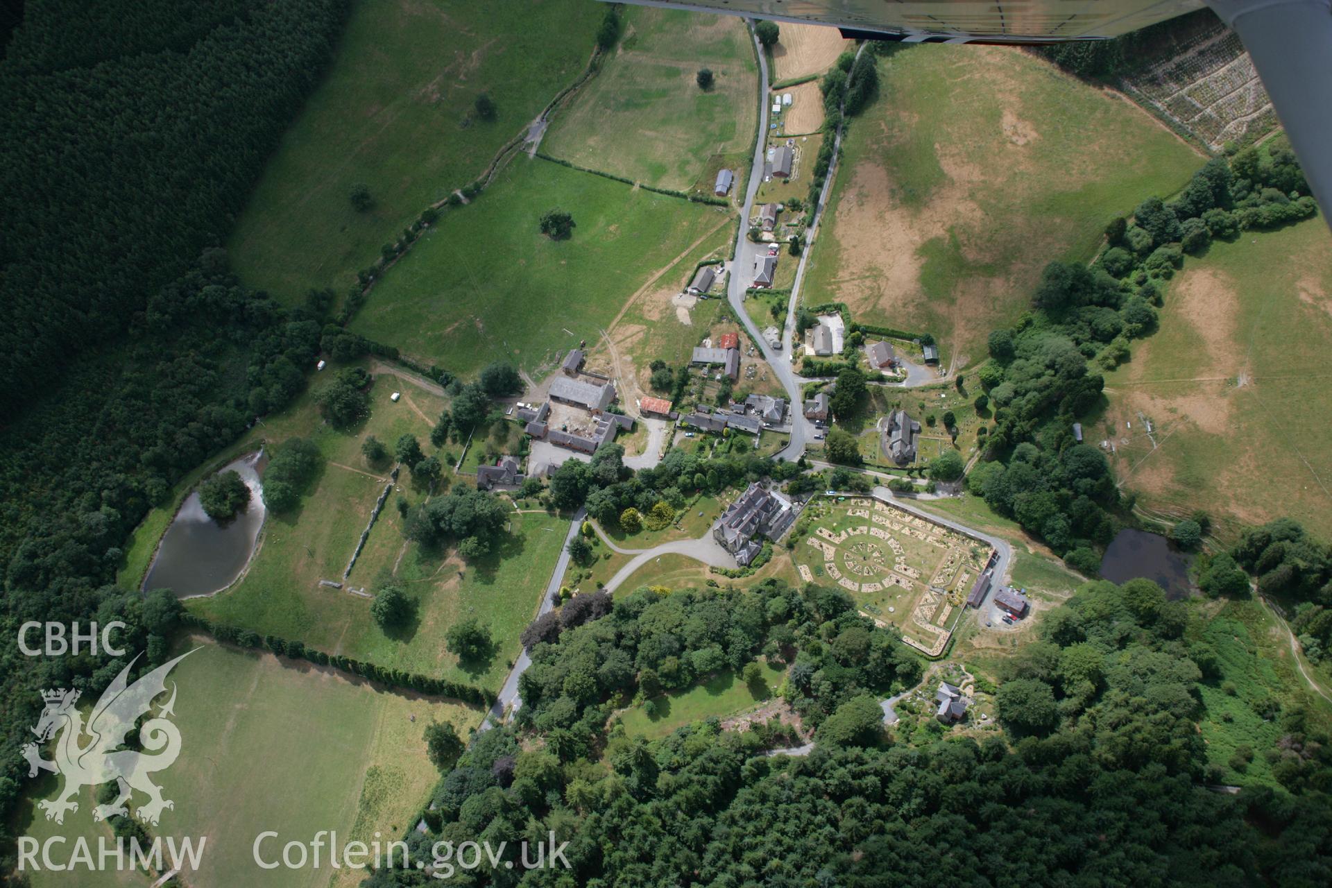 RCAHMW colour oblique aerial photograph of Abbey Cwmhir. Taken on 27 July 2006 by Toby Driver.