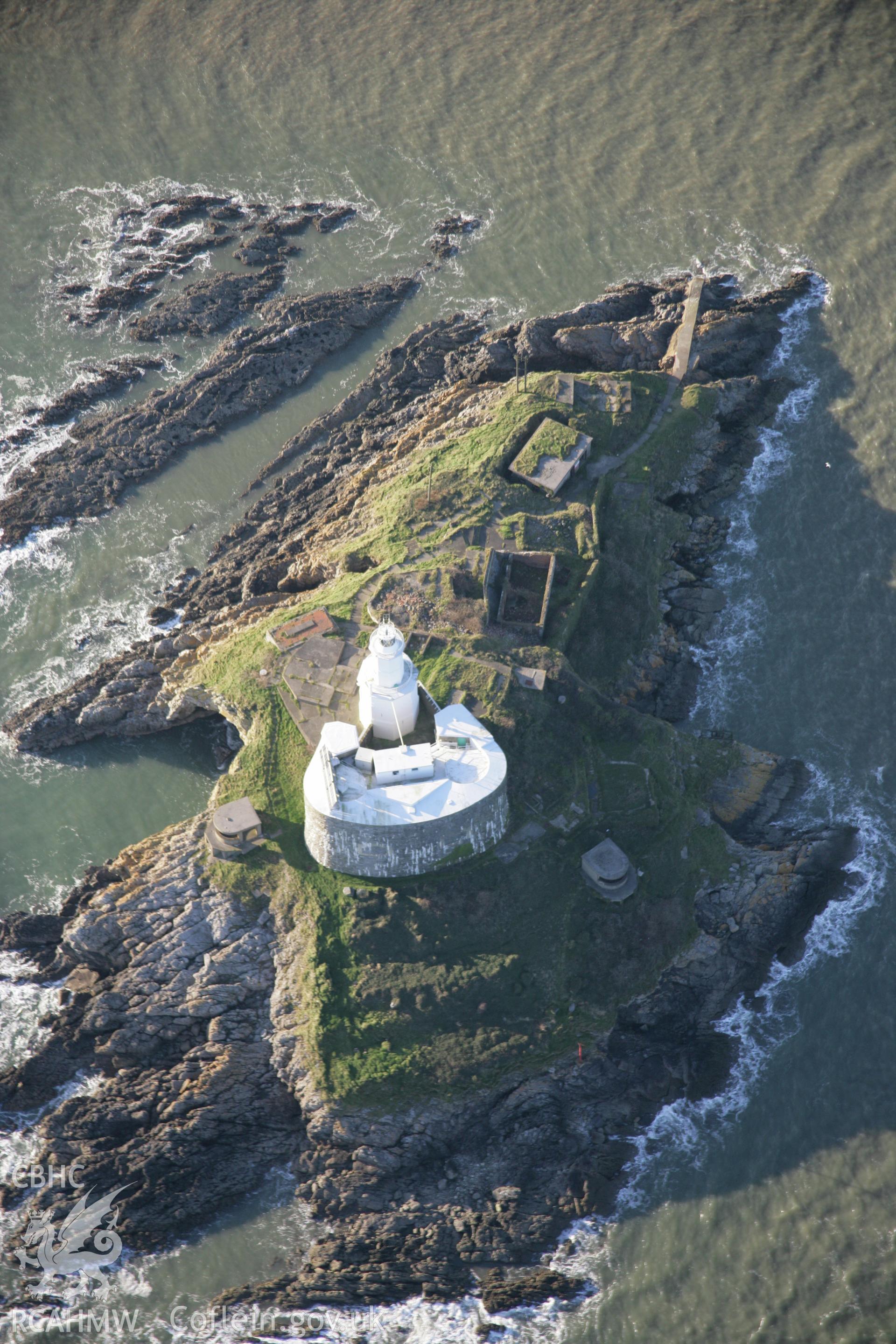 RCAHMW colour oblique aerial photograph of Mumbles Lighthouse, viewed from the east. Taken on 26 January 2006 by Toby Driver.