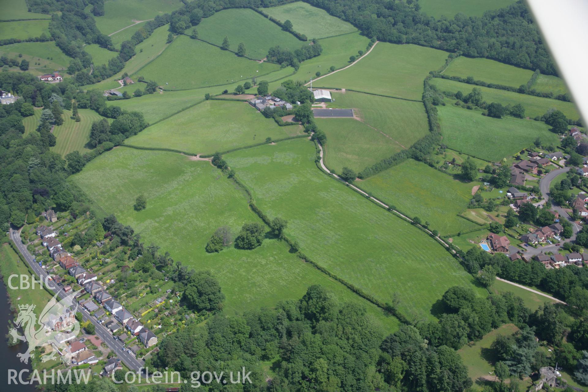 RCAHMW colour oblique aerial photograph of the site of a battle at Pwll Melyn, Usk and the landscape to the north-east. Taken on 09 June 2006 by Toby Driver.