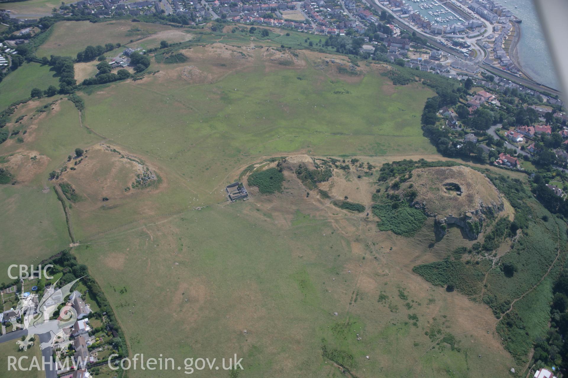 RCAHMW colour oblique aerial photograph of Deganwy Castle. Taken on 25 July 2006 by Toby Driver.