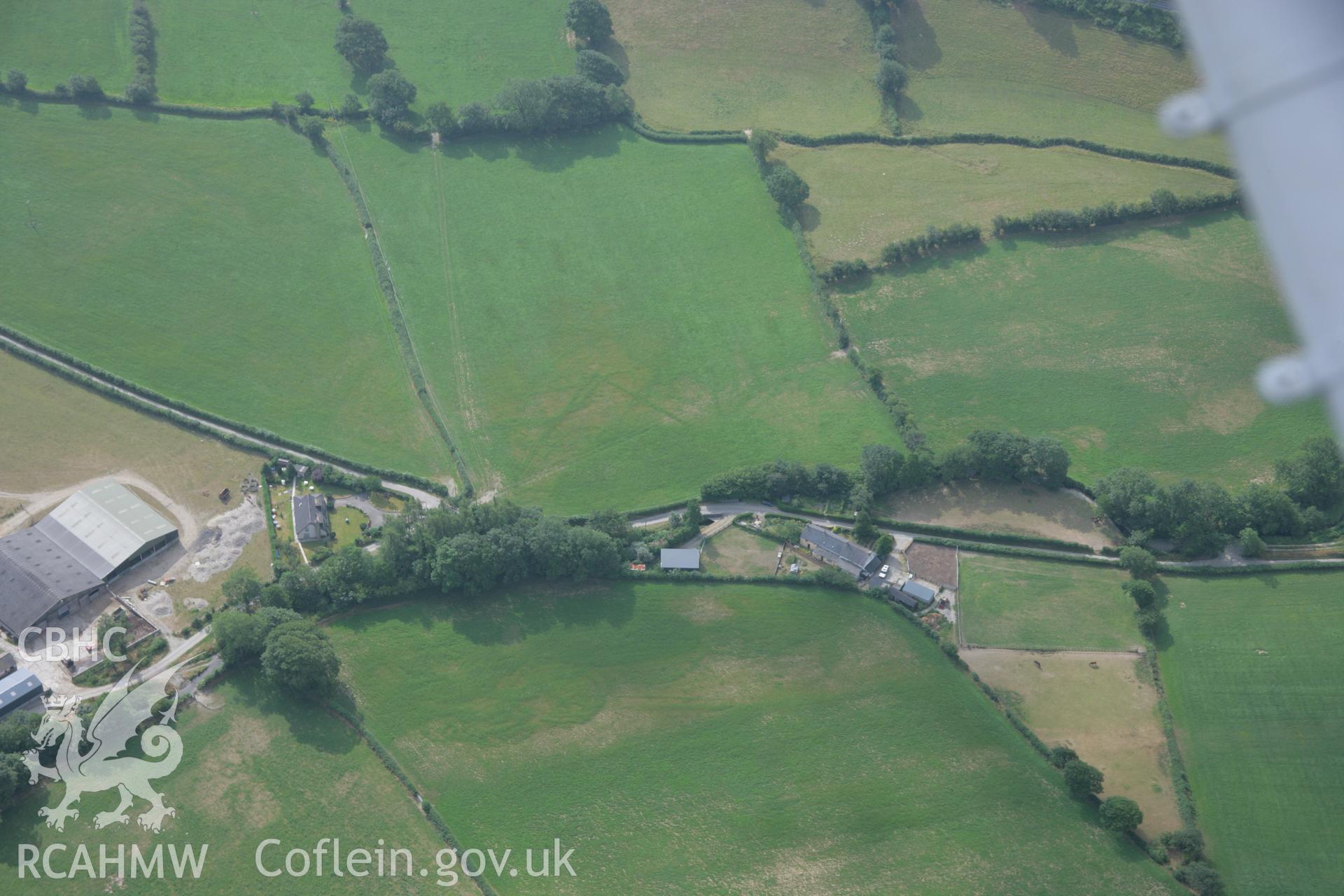 RCAHMW colour oblique aerial photograph of the cropmarks at Cyncoed that possibly represent an enclosure.. Taken on 21 July 2006 by Toby Driver.