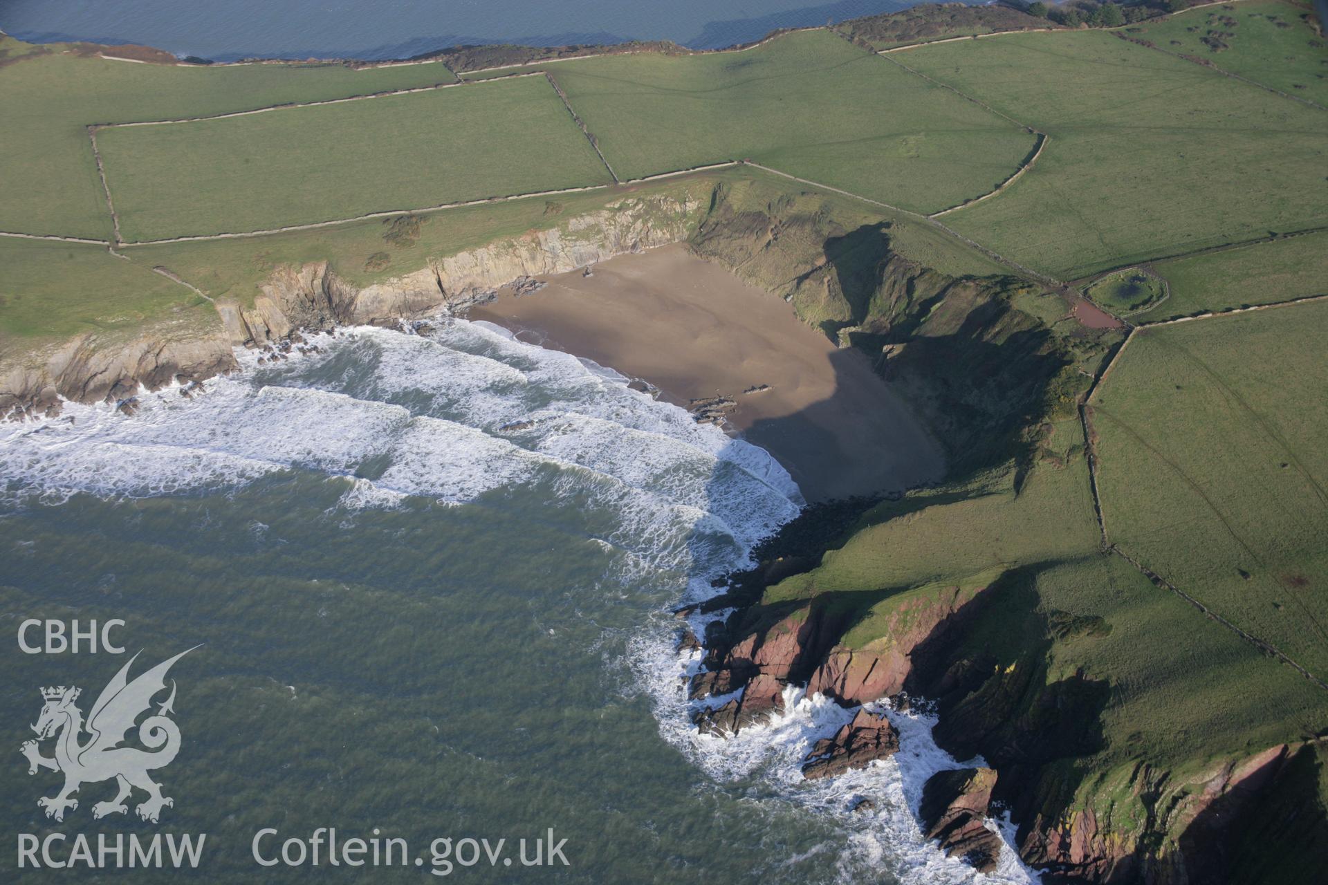 RCAHMW colour oblique aerial photograph of Caldey Island. A view from the south-west illustrating the geological divide. Taken on 11 January 2006 by Toby Driver.