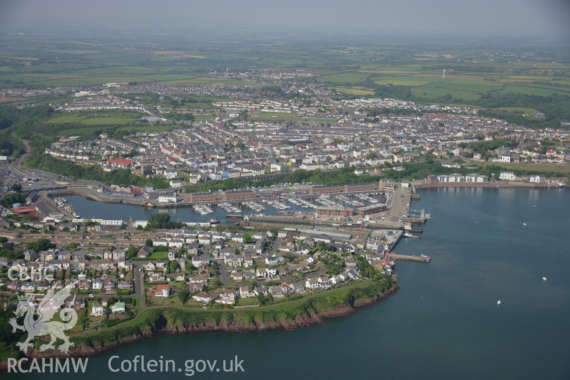 RCAHMW colour oblique aerial photograph of Milford Haven, viewed from the south-west. Taken on 08 June 2006 by Toby Driver.