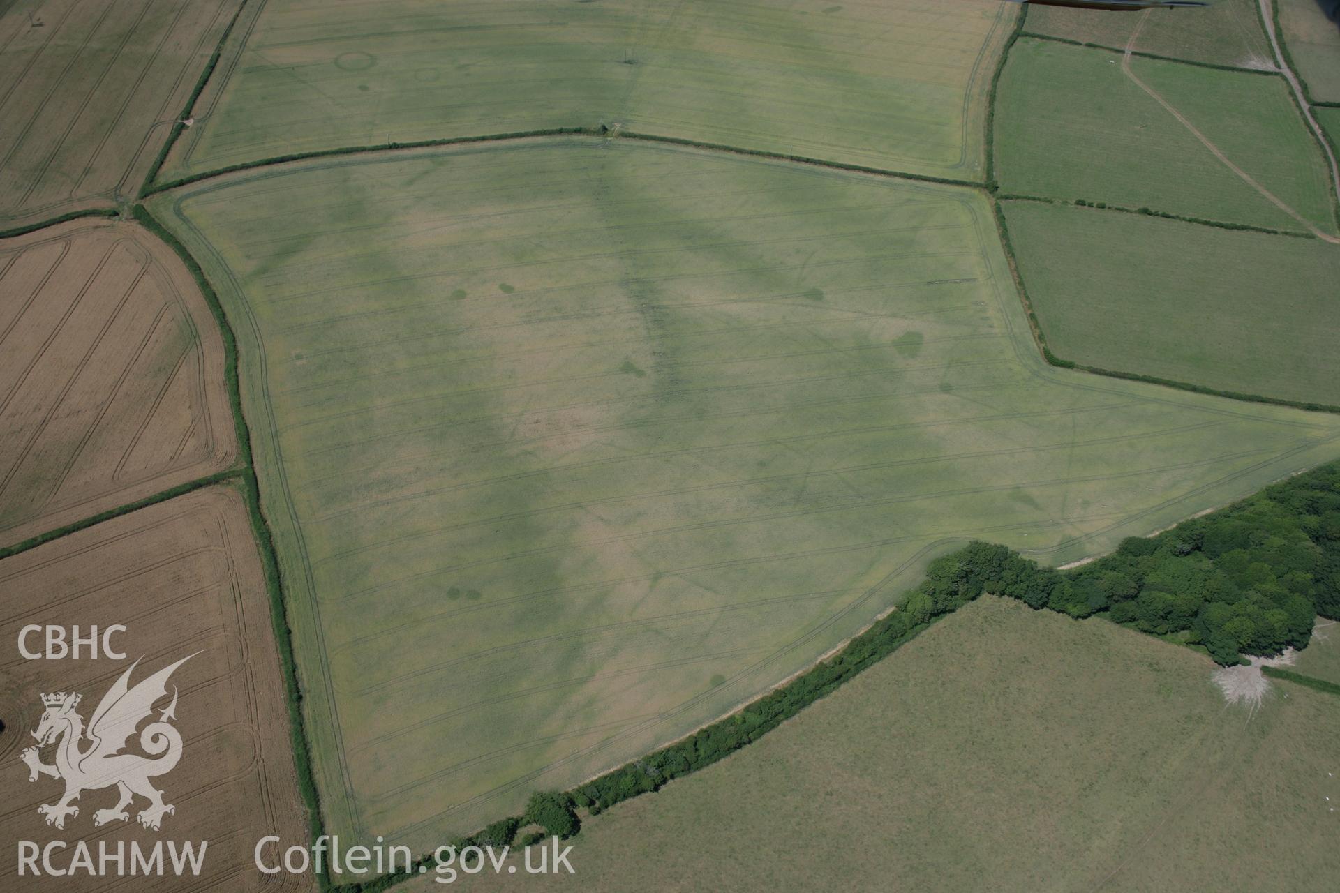 RCAHMW colour oblique aerial photograph of St Donat's Deserted Village. Taken on 24 July 2006 by Toby Driver.