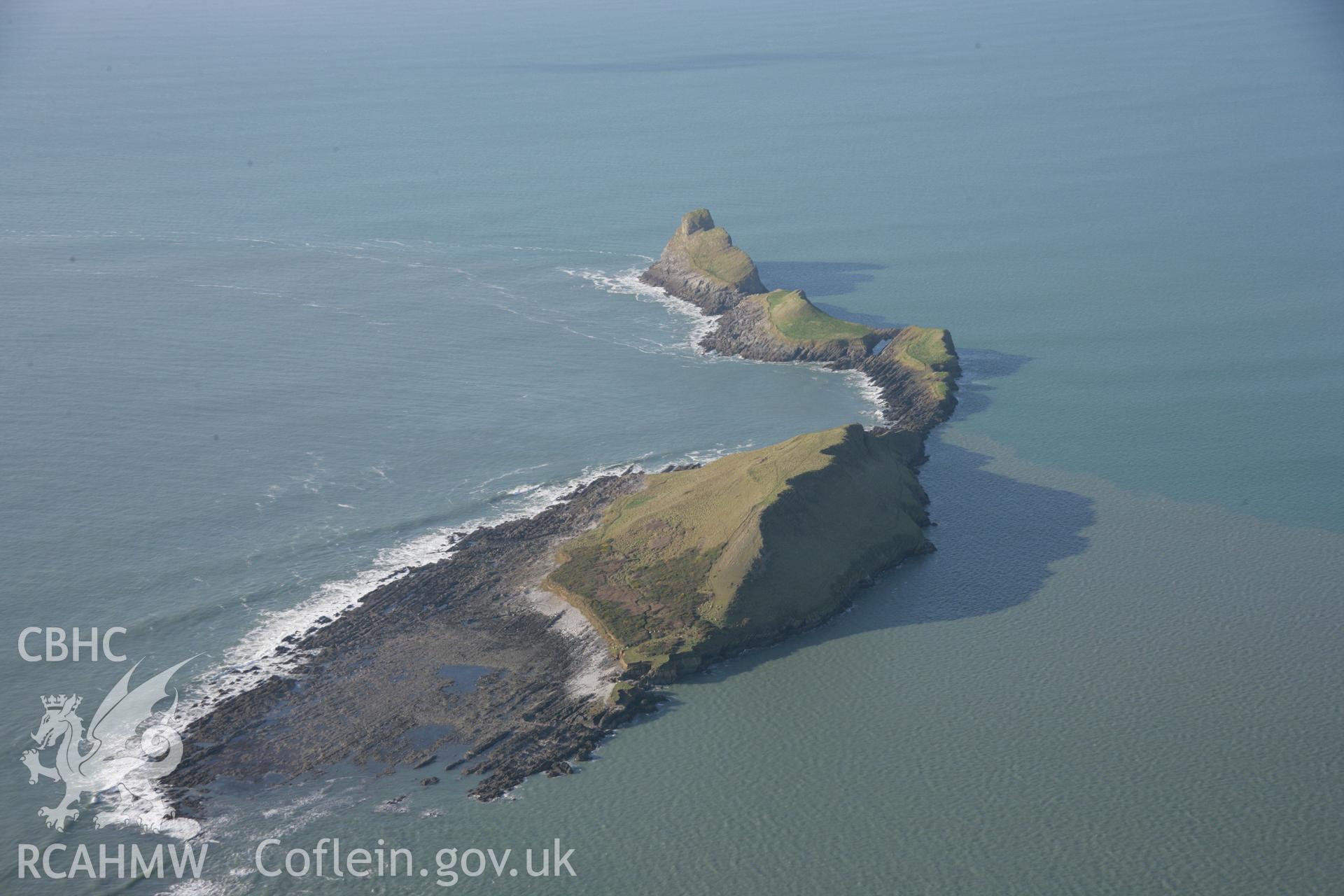 RCAHMW colour oblique aerial photograph of Worms Head Enclosure from the east. Taken on 26 January 2006 by Toby Driver.