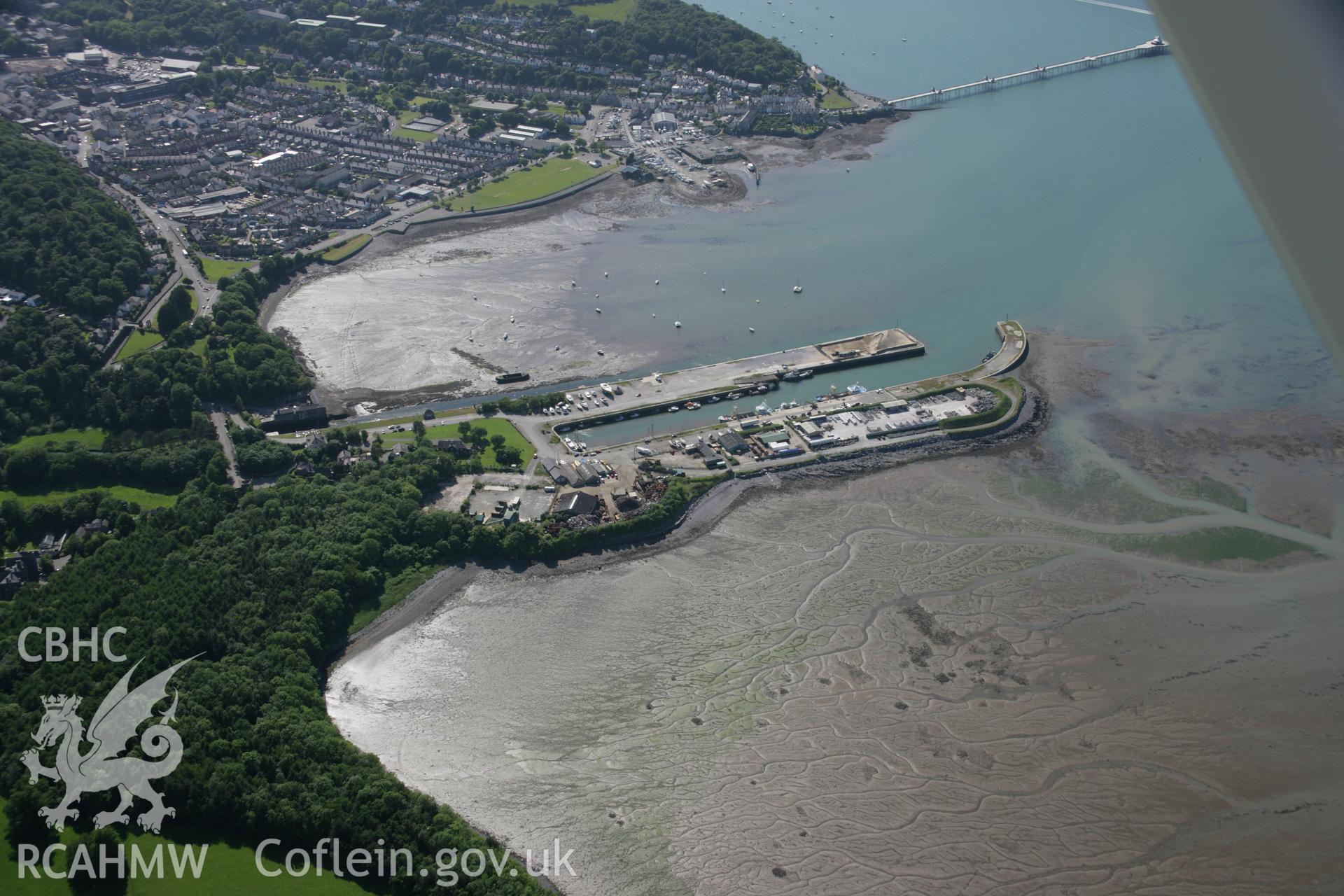 RCAHMW colour oblique aerial photograph of Porth Penrhyn from the east. Taken on 14 June 2006 by Toby Driver.