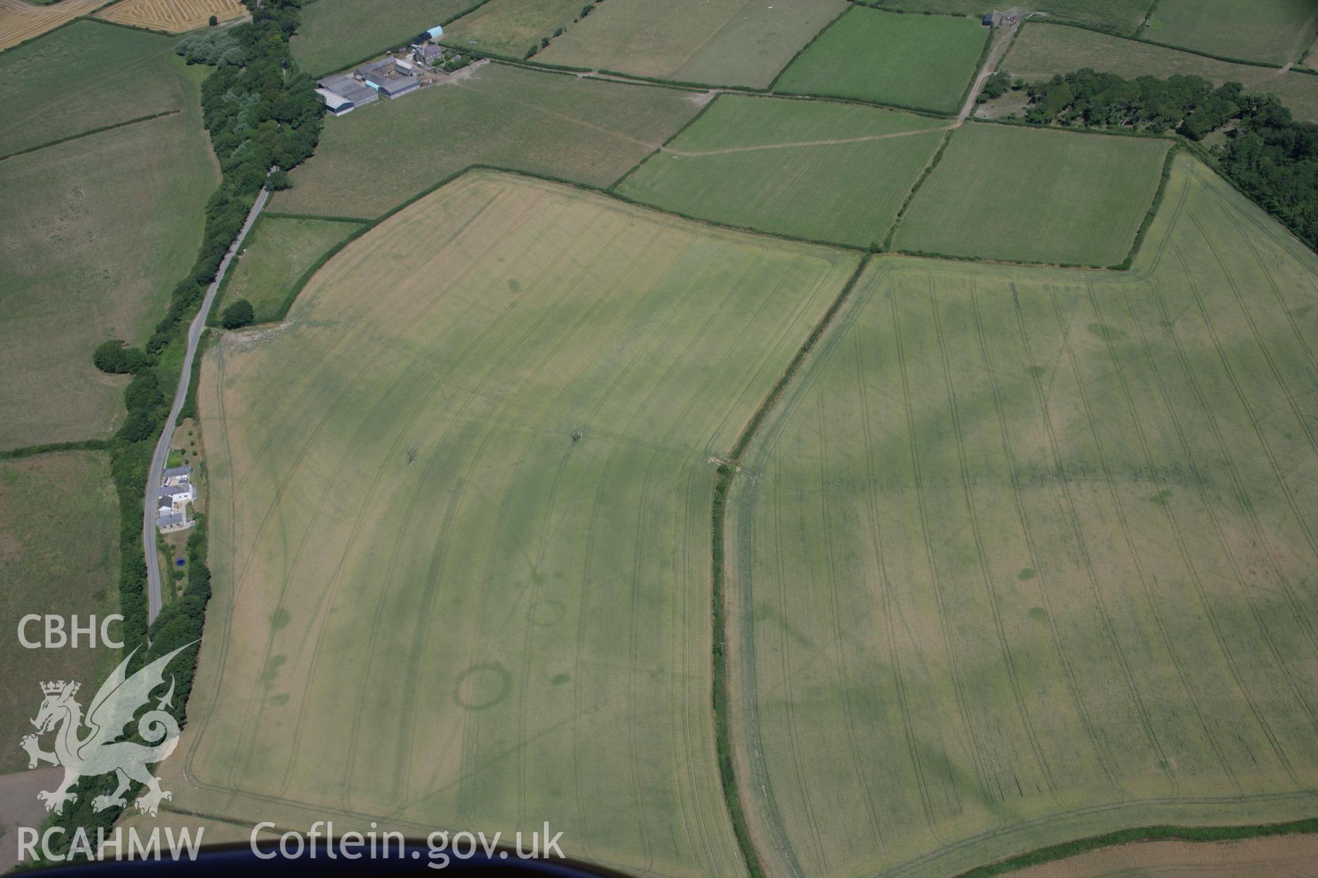 RCAHMW colour oblique aerial photograph of St Donat's Deserted Village. Taken on 24 July 2006 by Toby Driver.