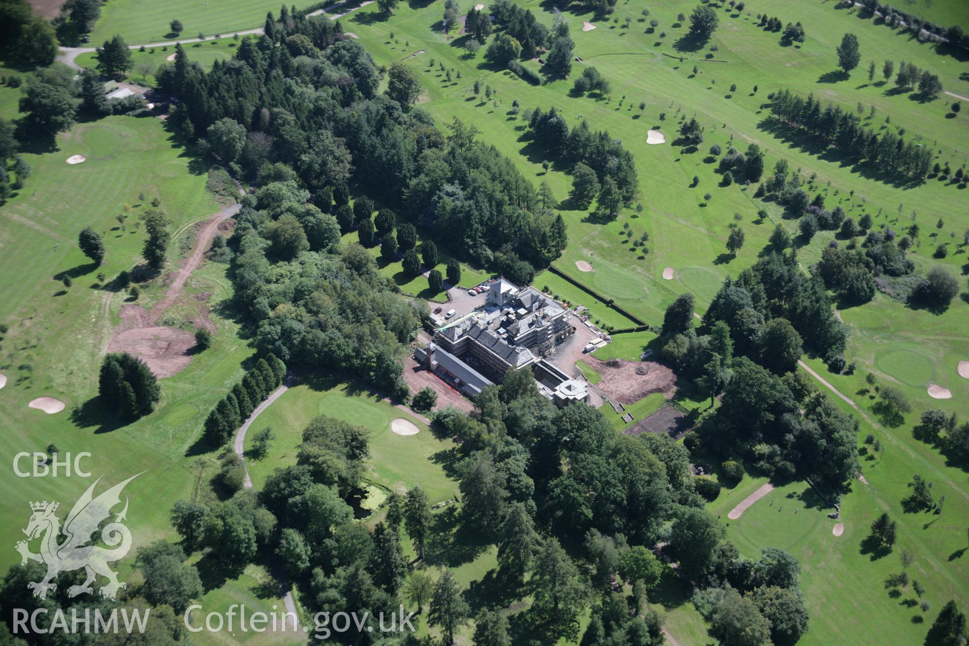 RCAHMW colour oblique aerial photograph of Penoyre Country House, in general view from north-west. Taken on 02 September 2005 by Toby Driver