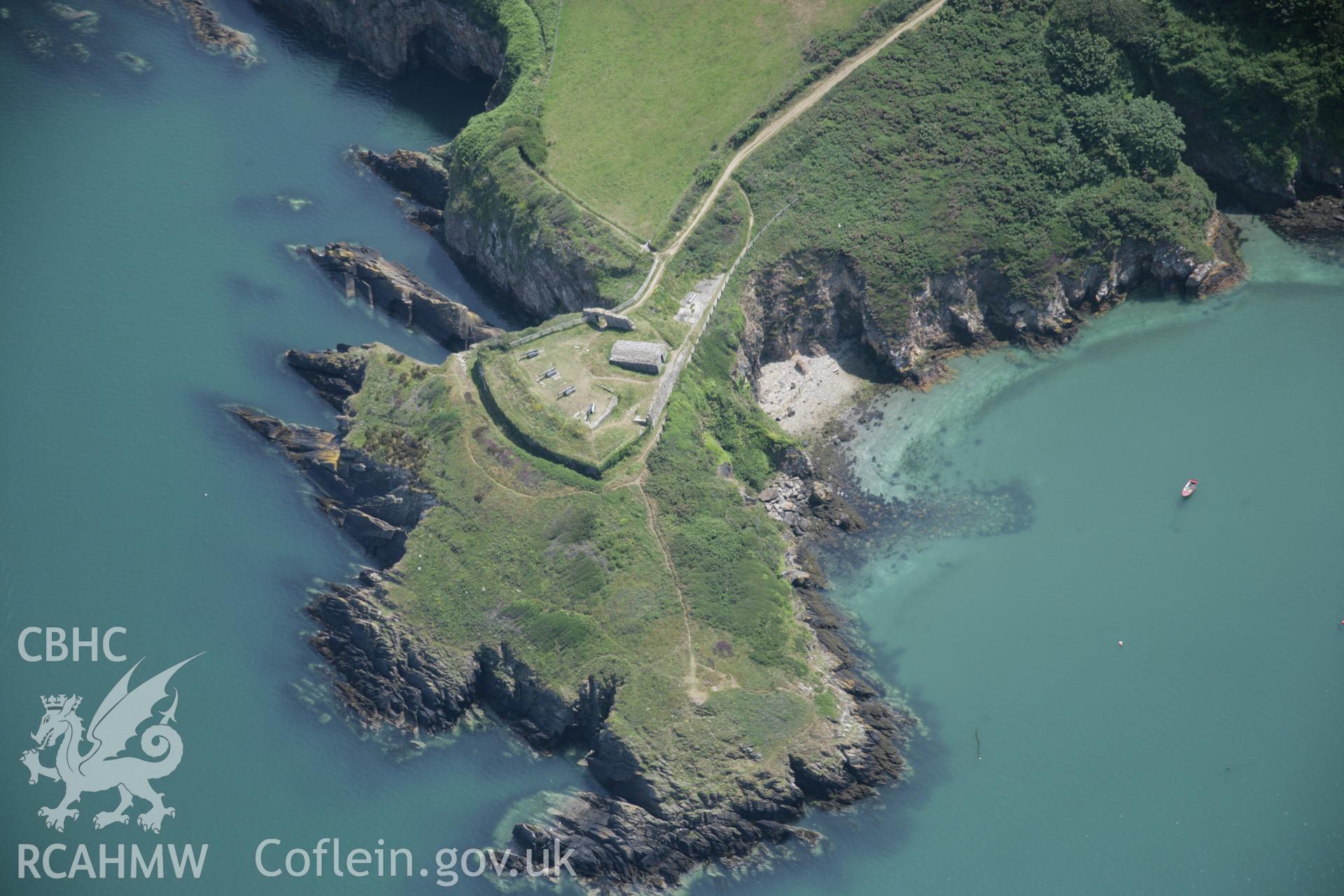 RCAHMW colour oblique aerial photograph of Castle Point Old Fort. Taken on 11 July 2005 by Toby Driver