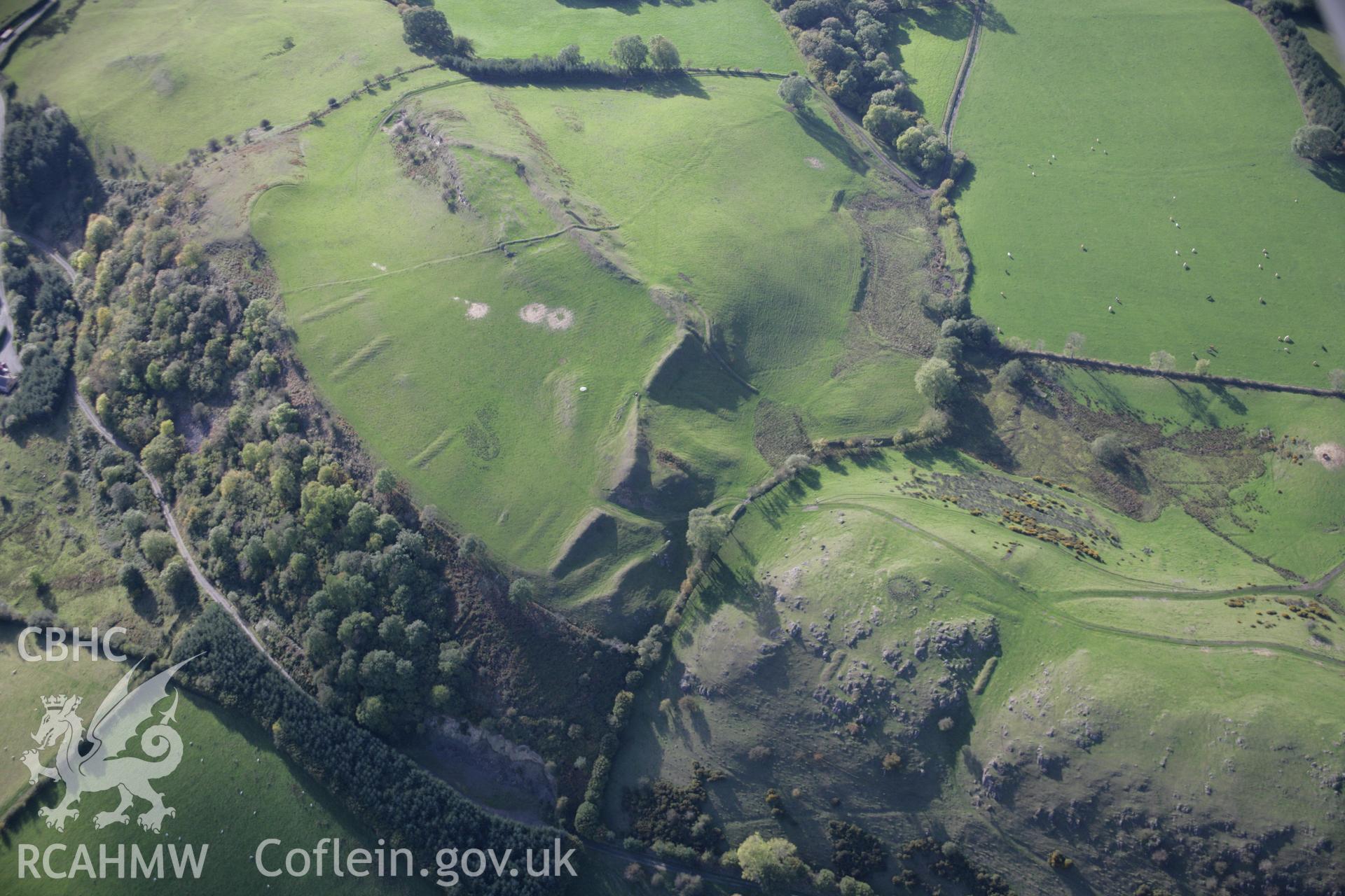 RCAHMW colour oblique aerial photograph of Graig Fawr Camp from the north-east with pillow mounds visible. Taken on 13 October 2005 by Toby Driver