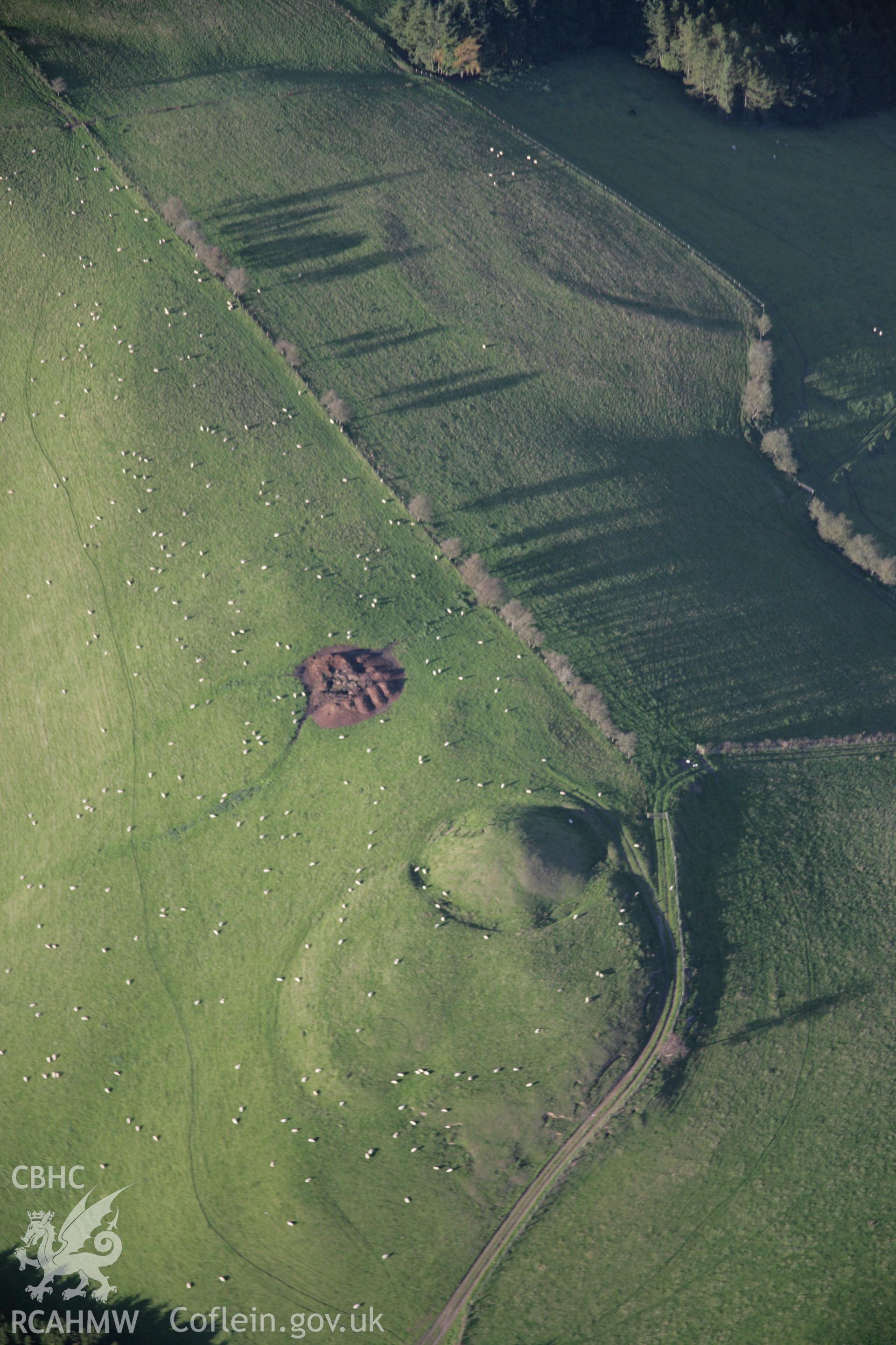 RCAHMW colour oblique aerial photograph of Tomen Bedd-Ugre from the south. Taken on 13 October 2005 by Toby Driver