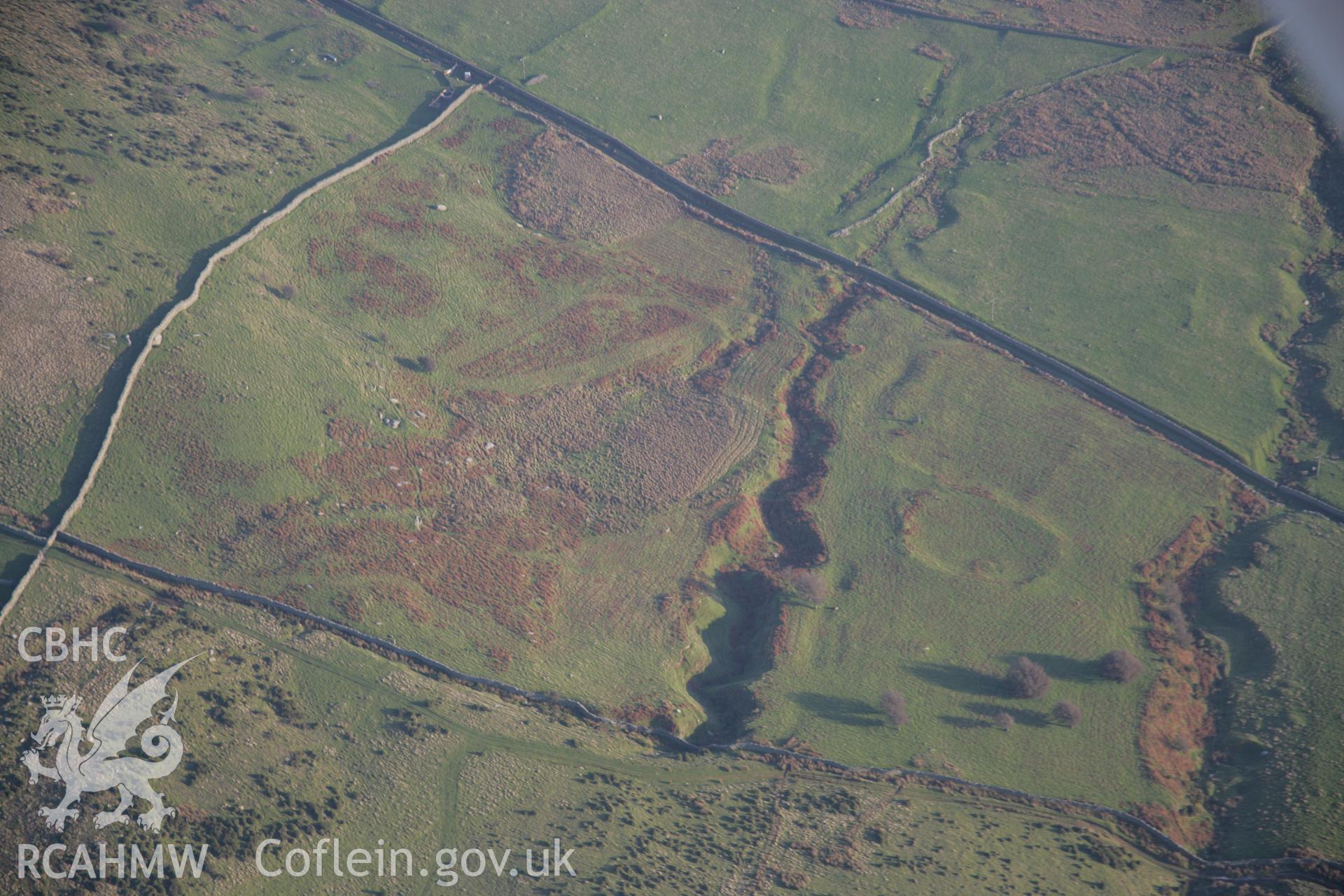 RCAHMW colour oblique aerial photograph of a homestead near Maen-y-Bardd viewed from the north-west. Taken on 21 November 2005 by Toby Driver