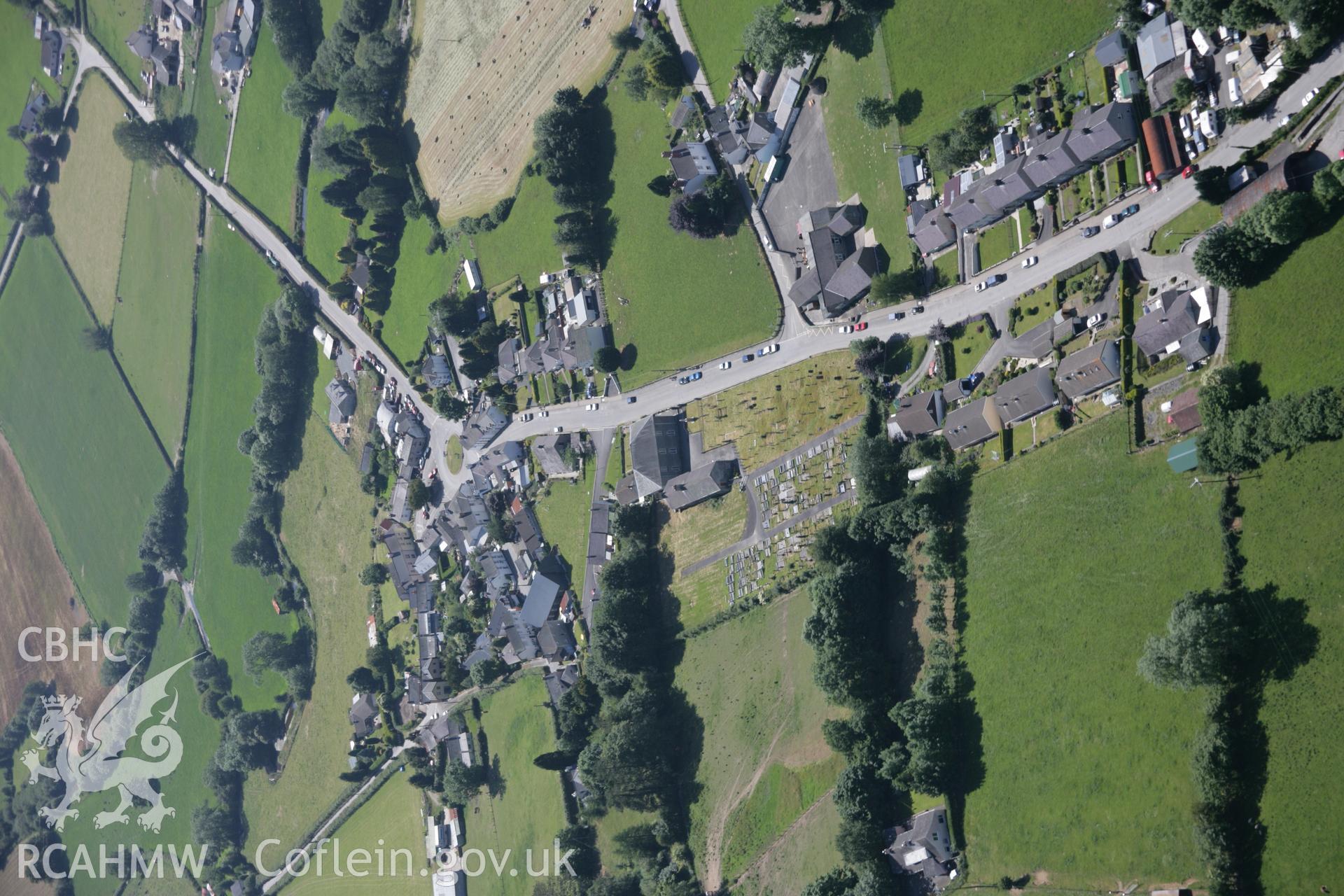 RCAHMW colour oblique aerial photograph of Llangeitho village, genral view from the north-east. Taken on 23 June 2005 by Toby Driver