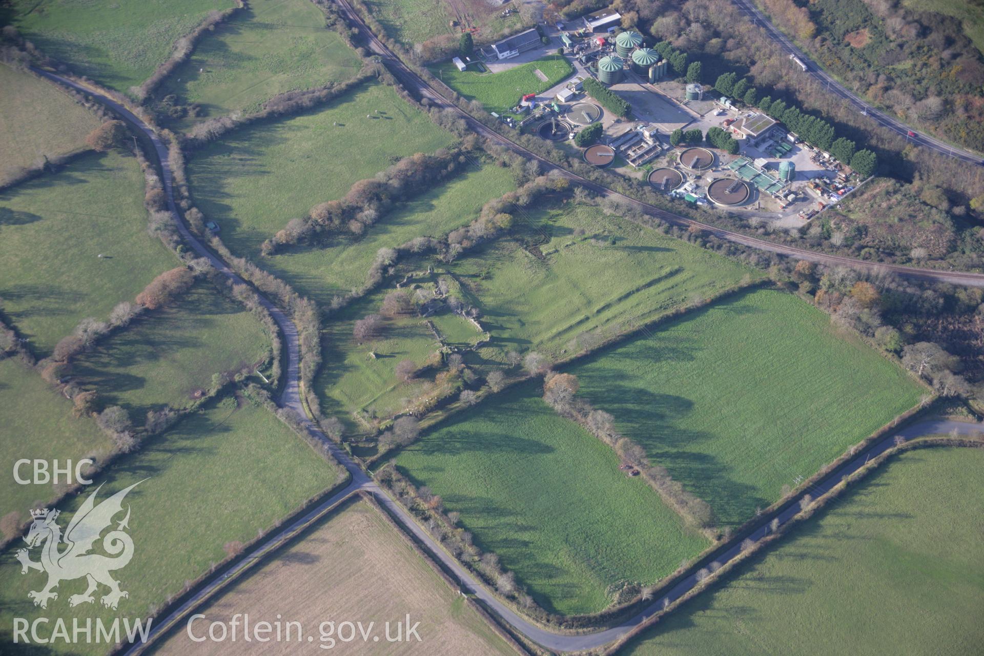 RCAHMW colour oblique aerial photograph of Haroldston House Garden Earthworks, Haverfordwest, in winter with low light looking west. Taken on 19 November 2005 by Toby Driver