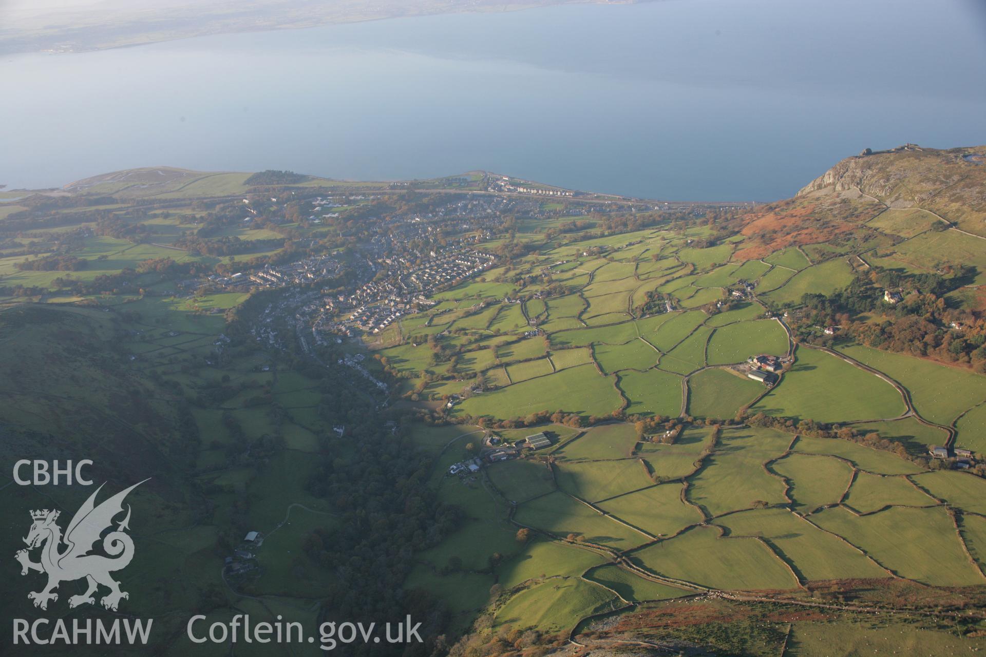RCAHMW colour oblique aerial photograph of Llanfairfechan showing landscape view from the south-east. Taken on 21 November 2005 by Toby Driver