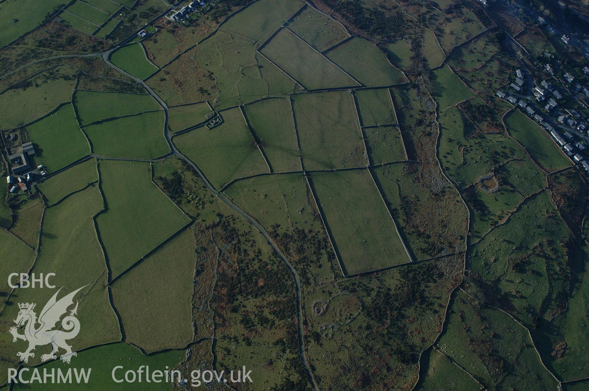 RCAHMW colour oblique aerial photograph of Muriau-y-gwyddelod Settlement Complex taken on 24/01/2005 by Toby Driver