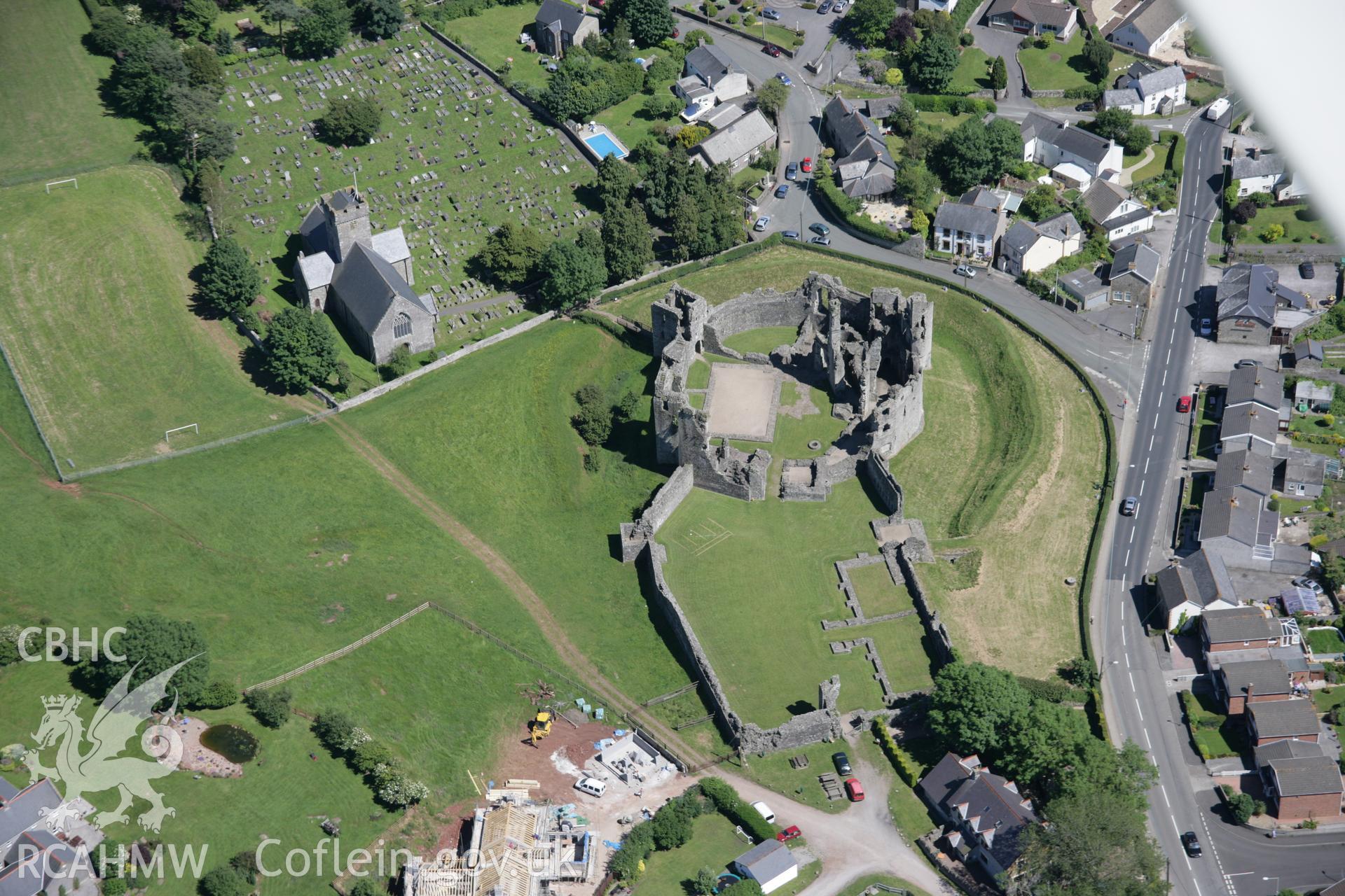 RCAHMW colour oblique aerial photograph of Coity Castle from the west. Taken on 22 June 2005 by Toby Driver
