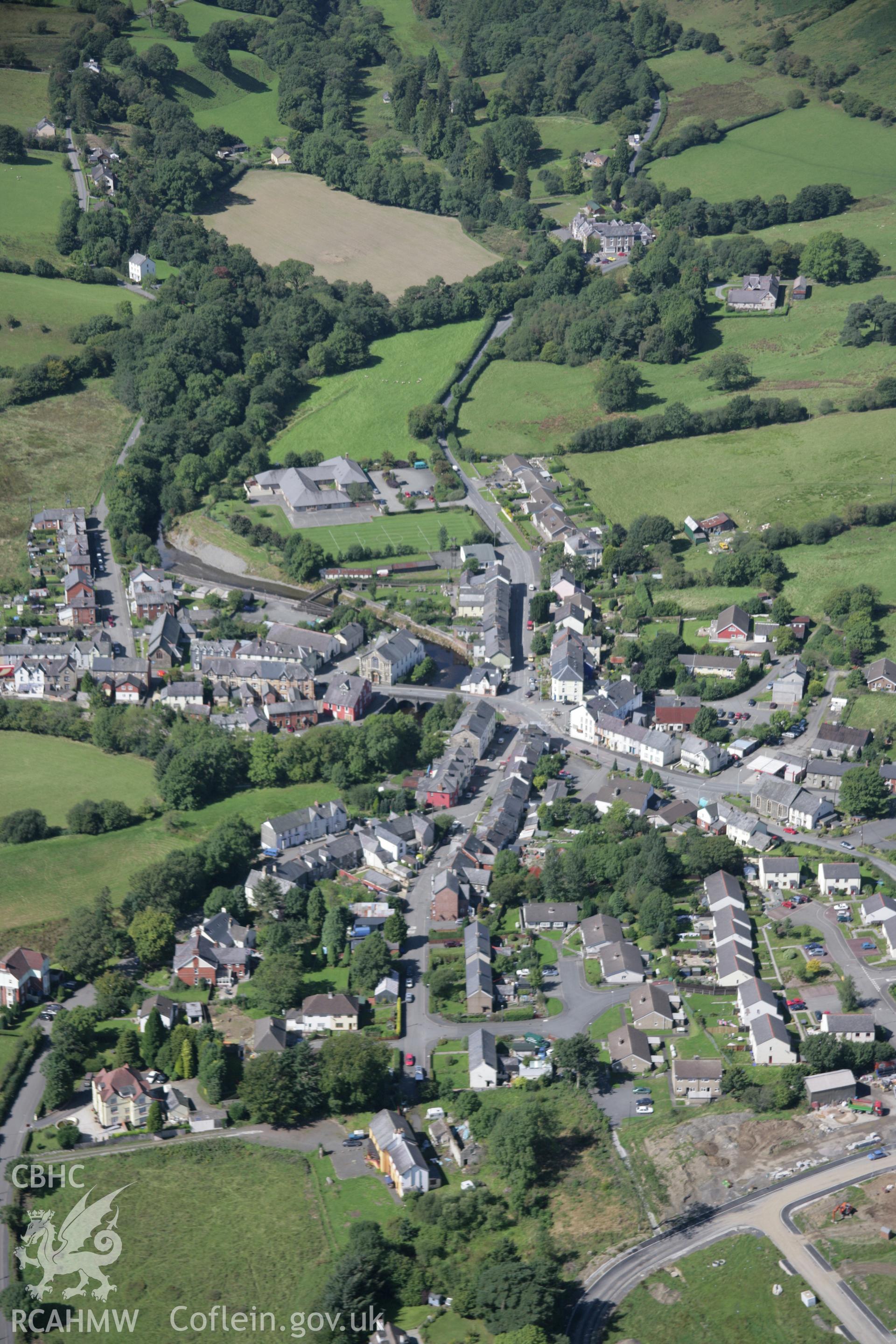 RCAHMW colour oblique aerial photograph of Llanwrtyd Wells town with view from south-east. Taken on 02 September 2005 by Toby Driver
