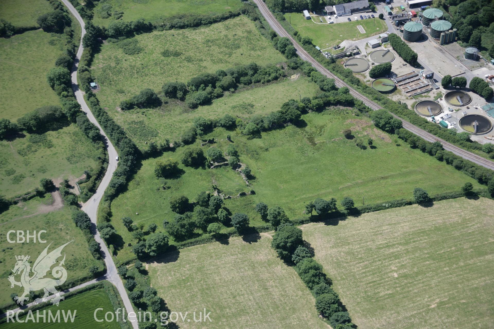 RCAHMW colour oblique aerial photograph of Haroldston House Garden Earthworks, Haverfordwest, with the Royal Commission's survey in progress, from the east. Taken on 22 June 2005 by Toby Driver