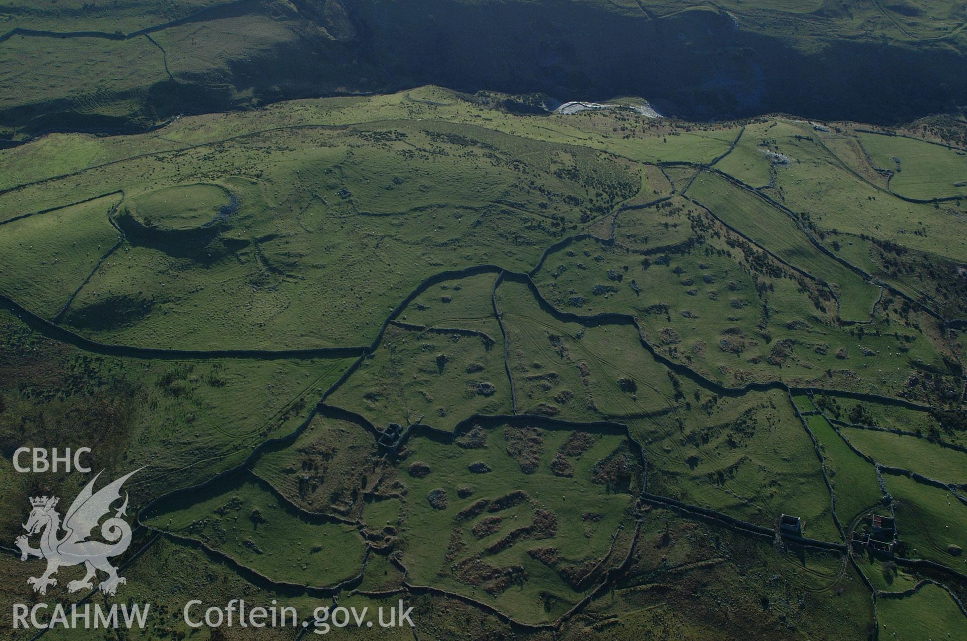 RCAHMW colour oblique aerial photograph of Pen-y-dinas taken on 24/01/2005 by Toby Driver