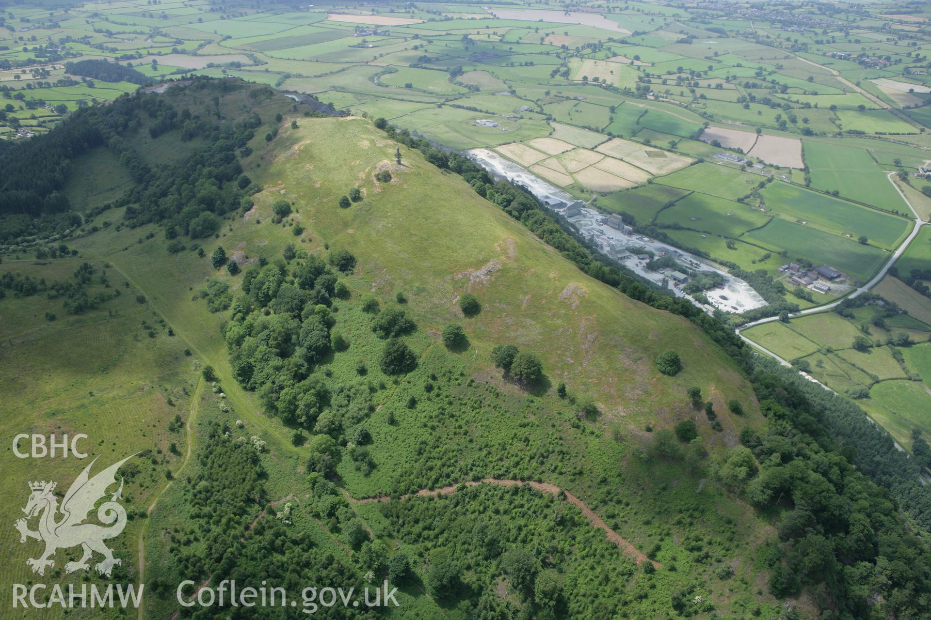 RCAHMW colour oblique photograph of Breddin Hillfort, with Breddin quarry. Taken by Toby Driver on 01/07/2008.