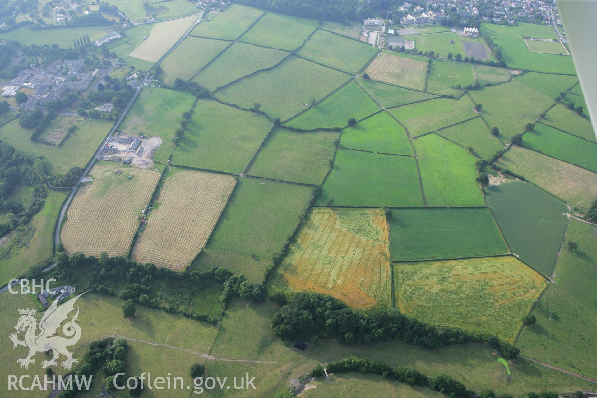 RCAHMW colour oblique photograph of Pennant Farm Cropmarks. Taken by Toby Driver on 24/07/2008.