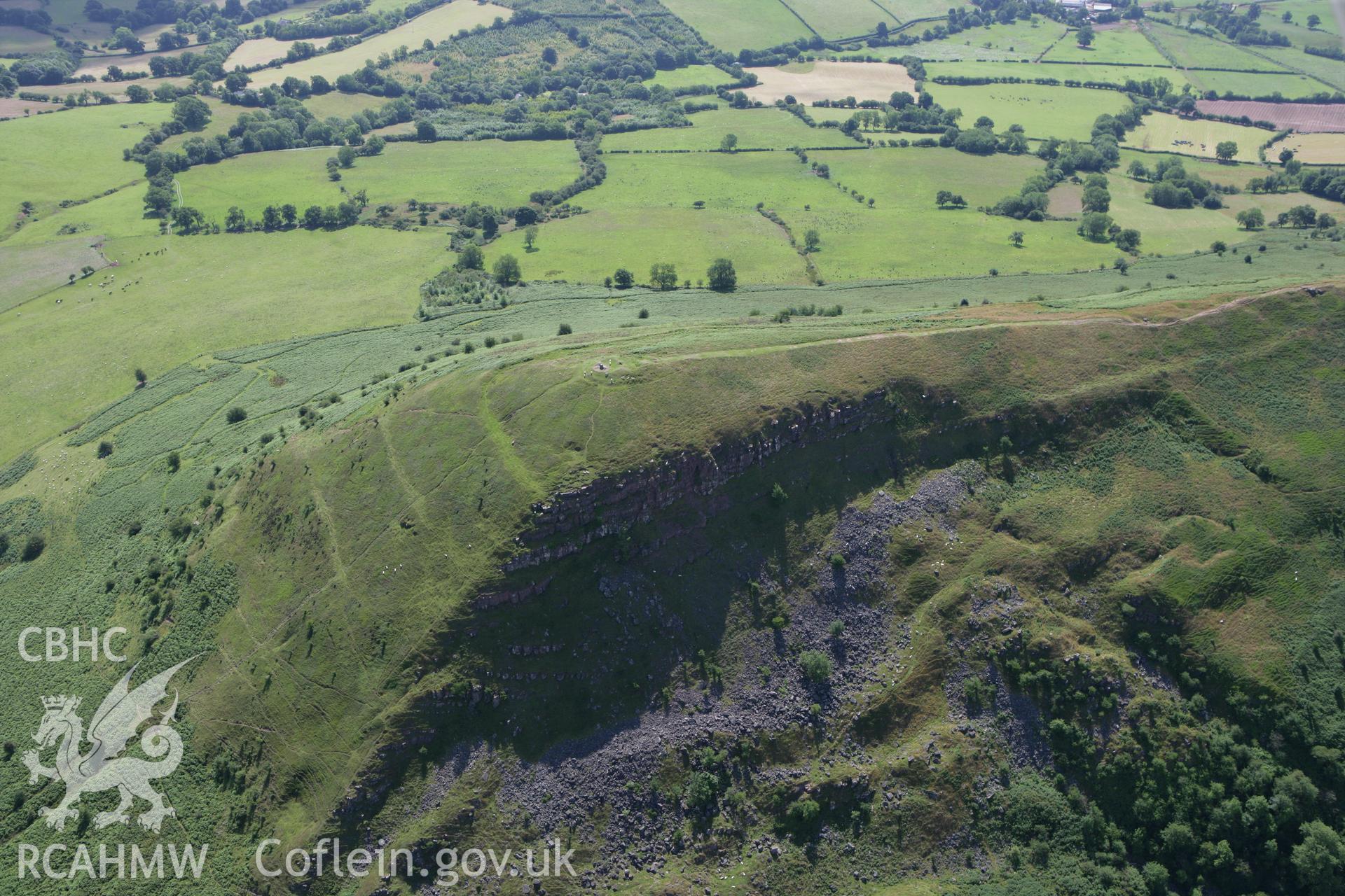 RCAHMW colour oblique photograph of Skirrid Fawr, remains of St Michael's Chapel and Skirrid Fawr Summit Enclosure, from the west. Taken by Toby Driver on 21/07/2008.
