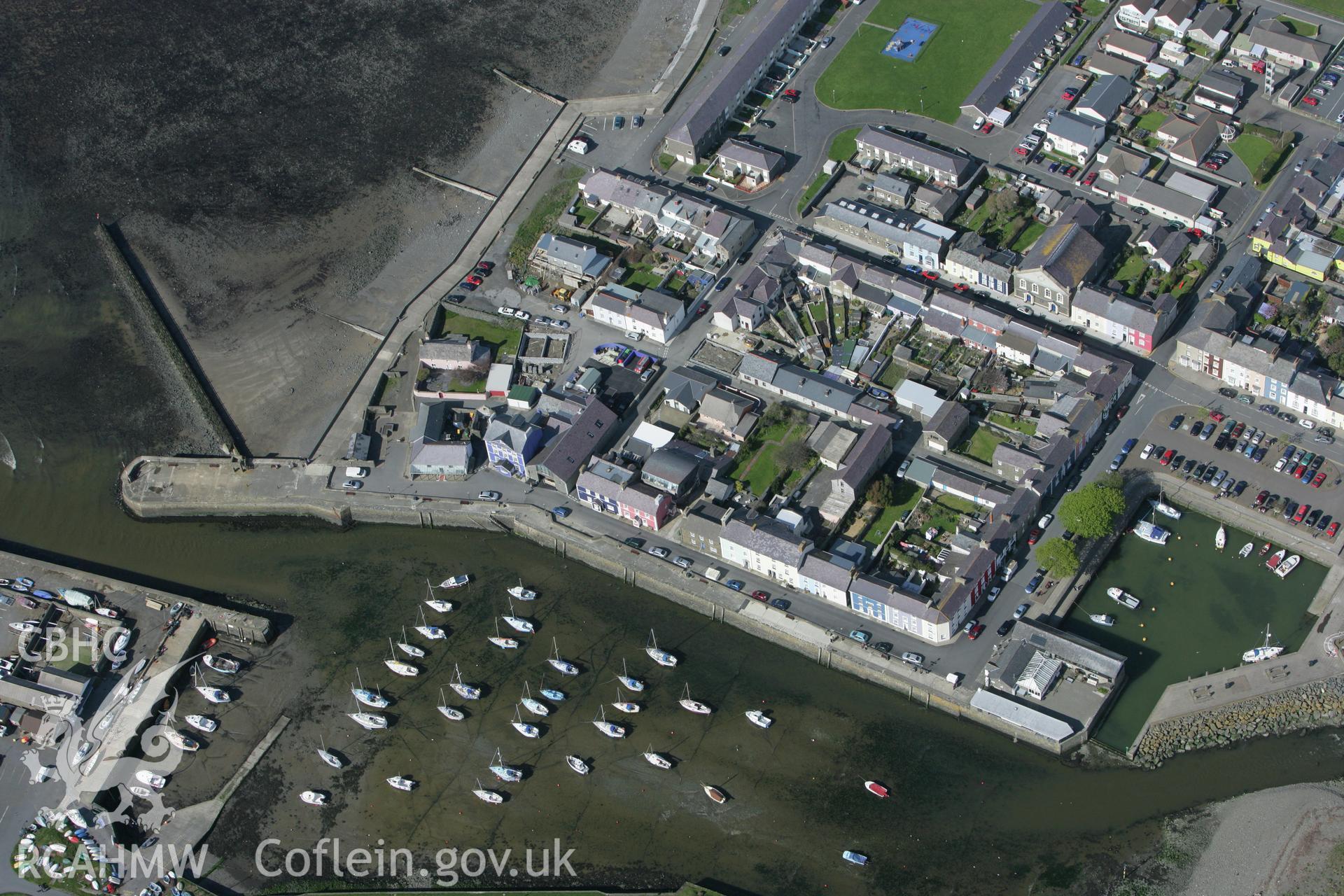 RCAHMW colour oblique photograph of Aberaeron Harbour and adjacent housing, Aberaeron. Taken by Toby Driver on 24/04/2008.