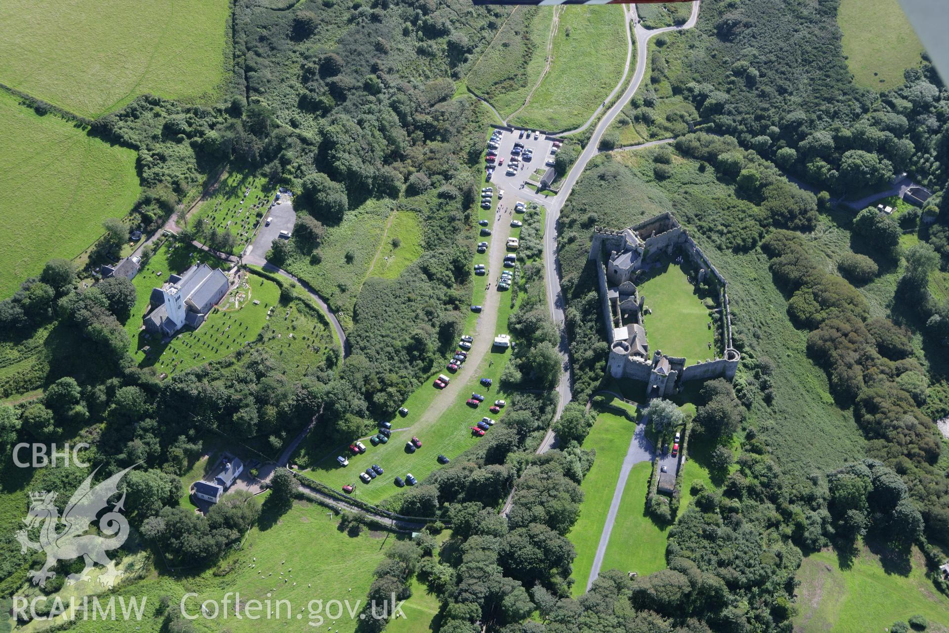 RCAHMW colour oblique aerial photograph of Manorbier Castle. Taken on 30 July 2007 by Toby Driver