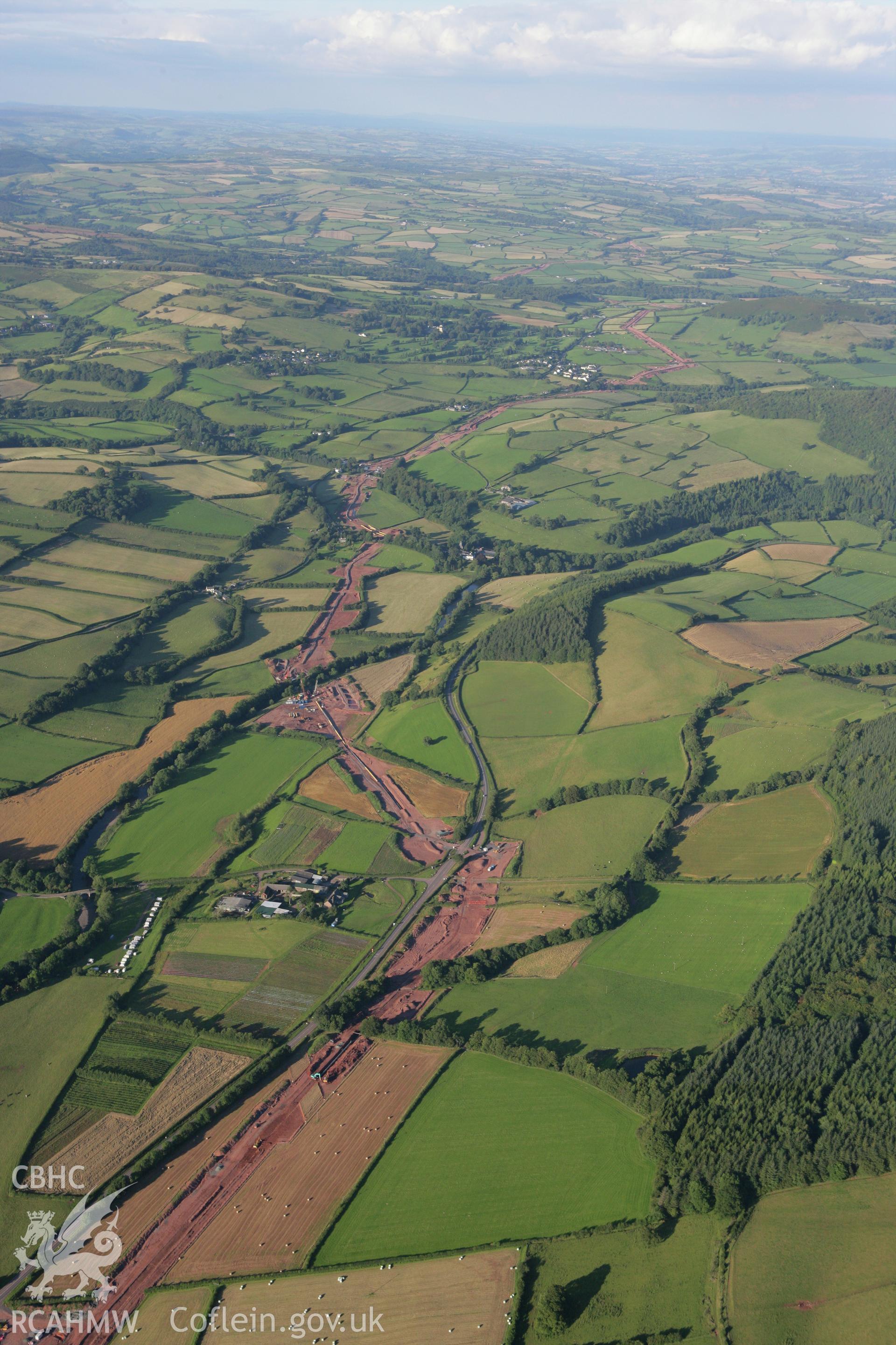 RCAHMW colour oblique aerial photograph of LNG pipeline east of Aberyscir. Taken on 08 August 2007 by Toby Driver
